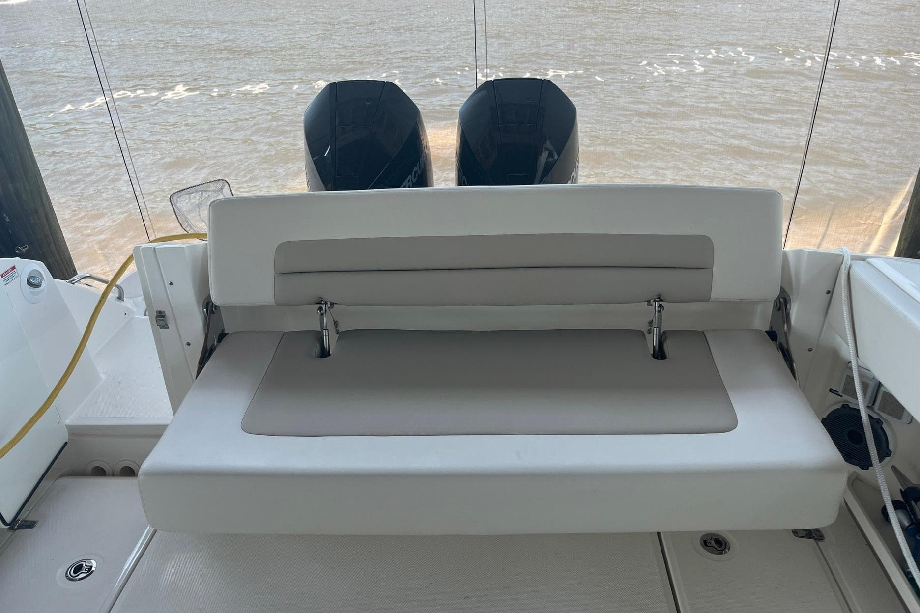 2022 Boston Whaler 320 Vantage boat with rear seating and dual engines.