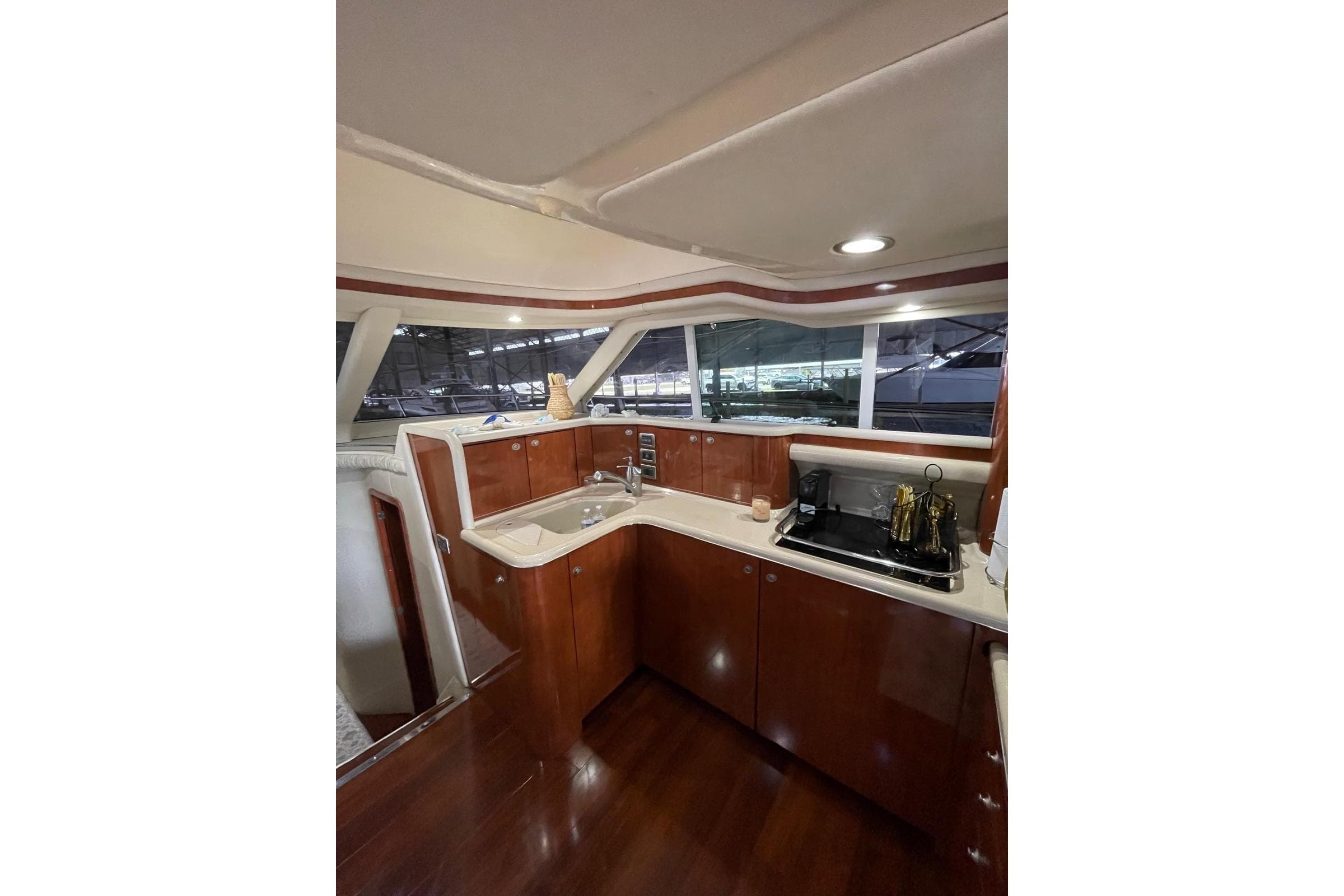 Luxurious kitchen interior of 2004 Sea Ray 480 Sedan Bridge yacht.