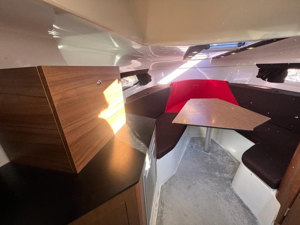 Interior of 2017 Beneteau Flyer 8.8 Sundeck with seating and table.