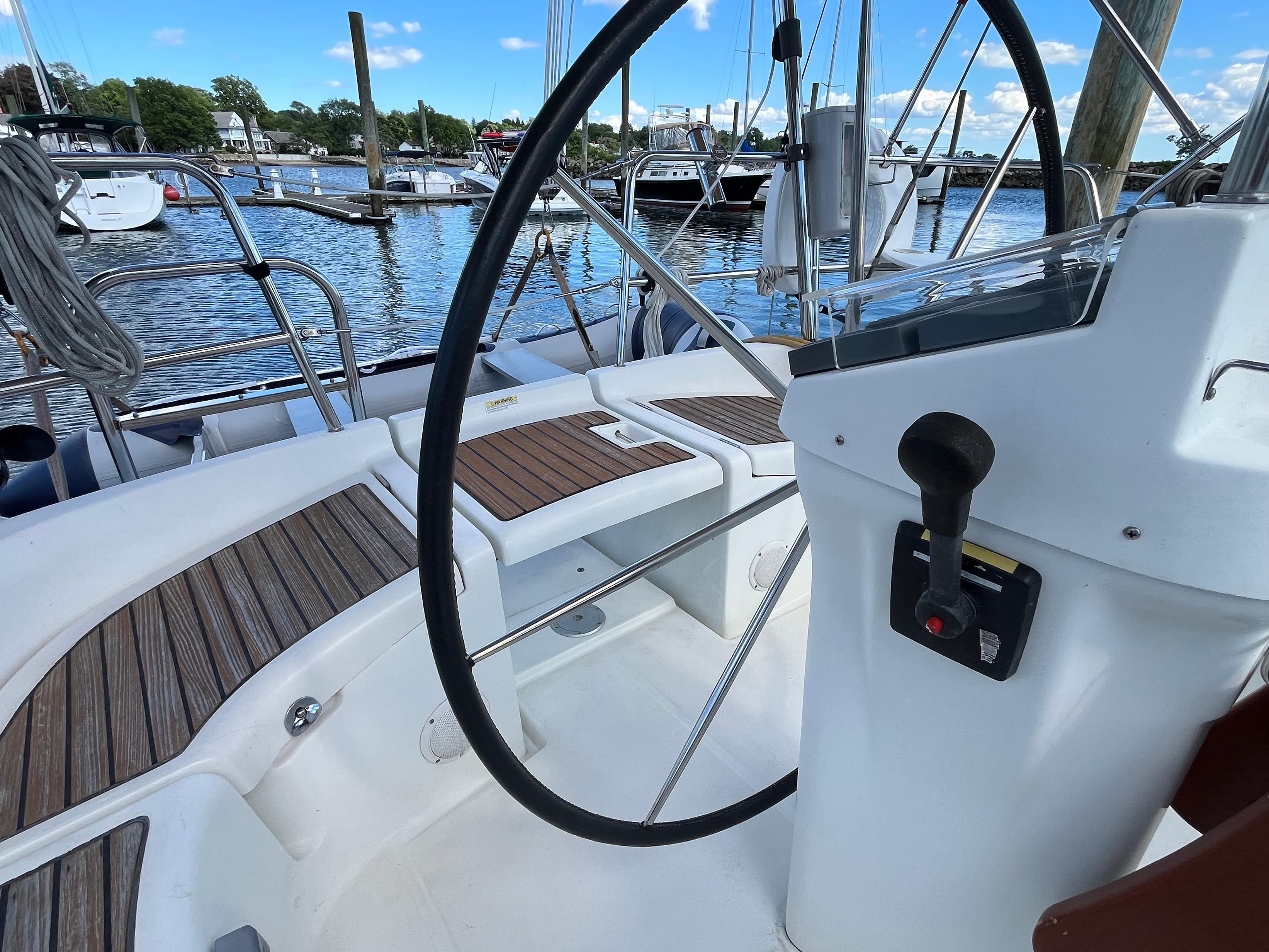 Cockpit of a 2004 Beneteau 423 yacht docked in marina.