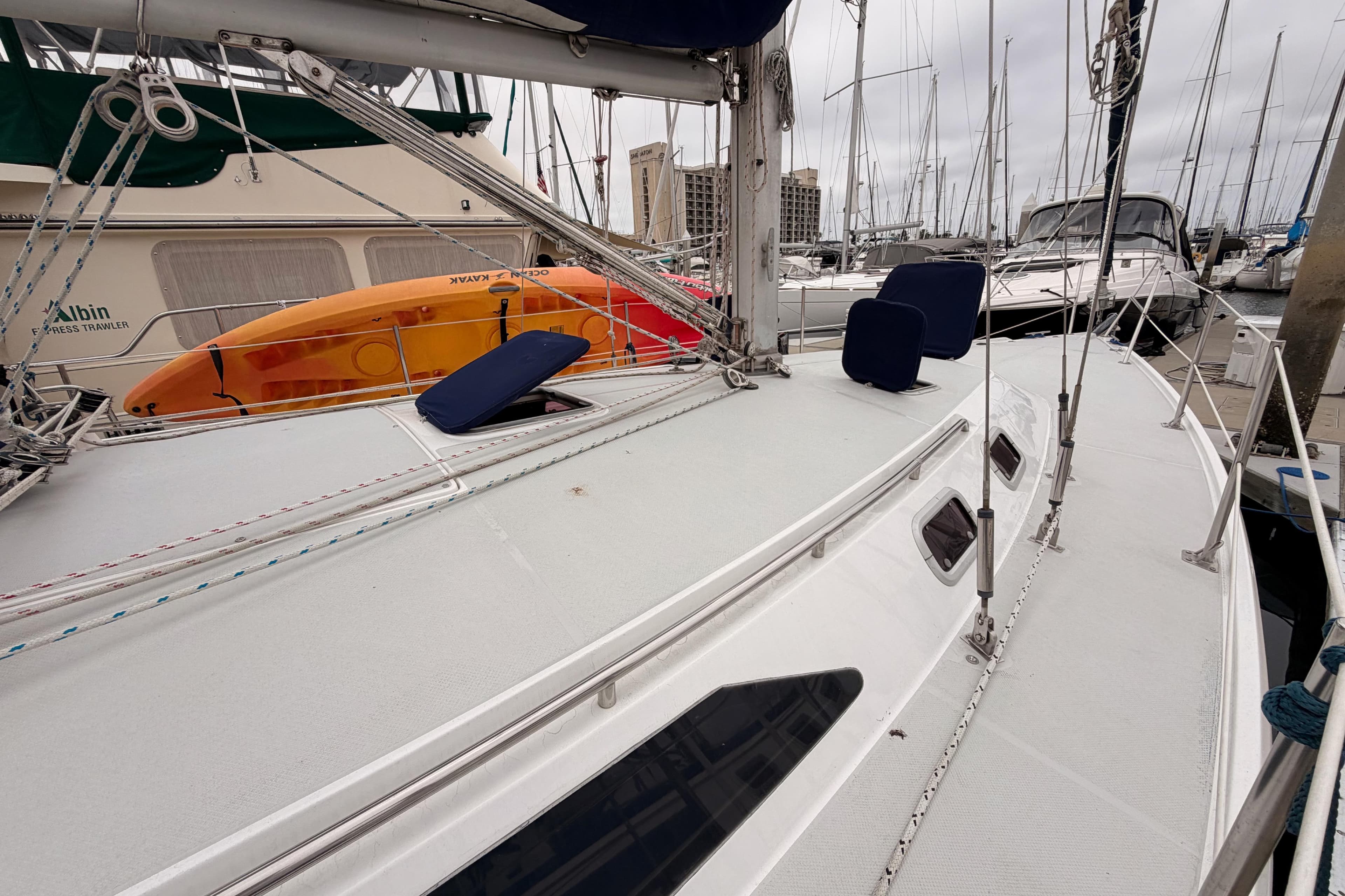 1996 Catalina 36 MkII sailboat docked, featuring deck and rigging details.