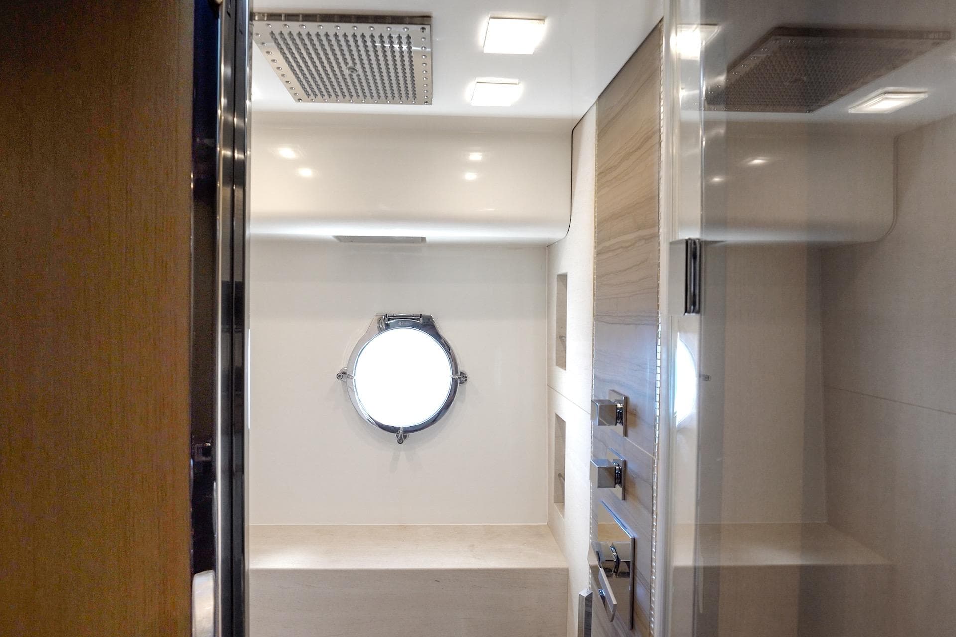 Luxurious bathroom interior of 2015 Monte Carlo Yachts MCY 86 with modern fixtures.