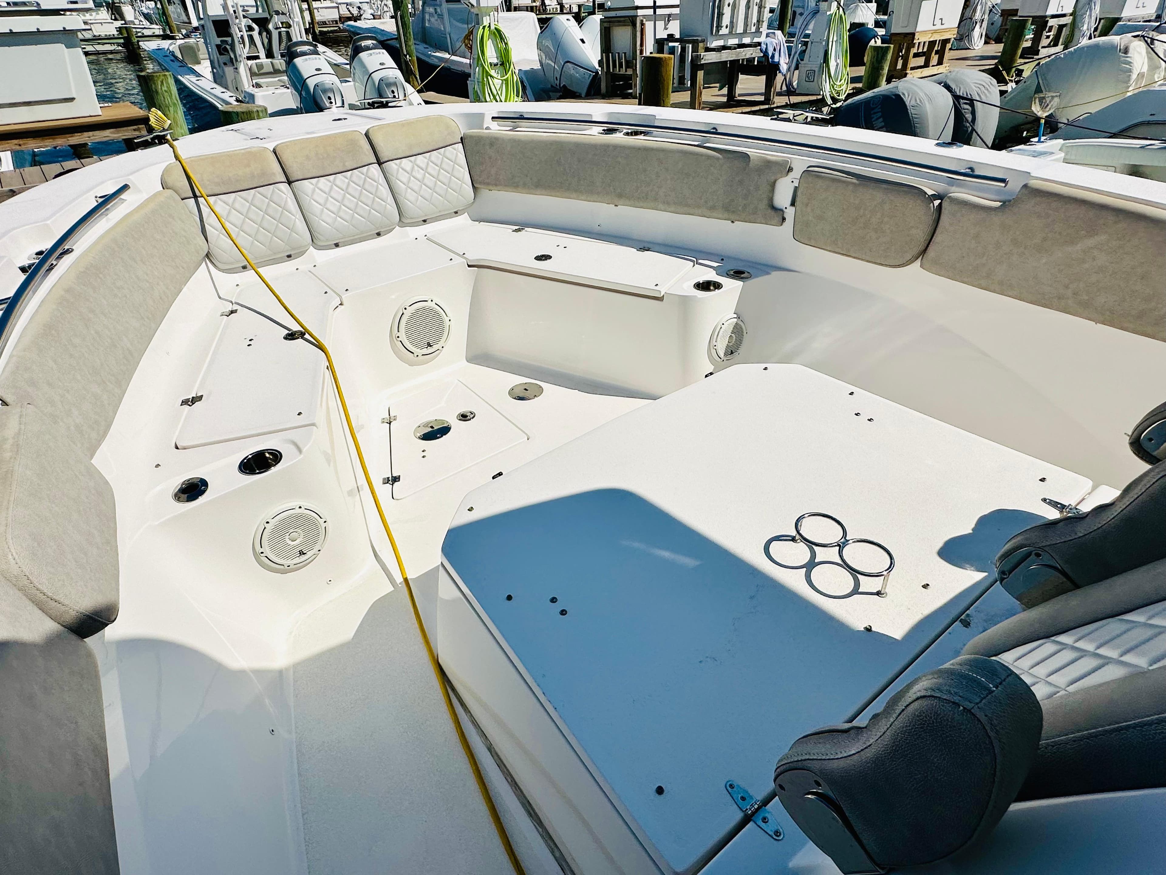 2019 Sea Fox 328 Commander boat interior with seating and cup holders.