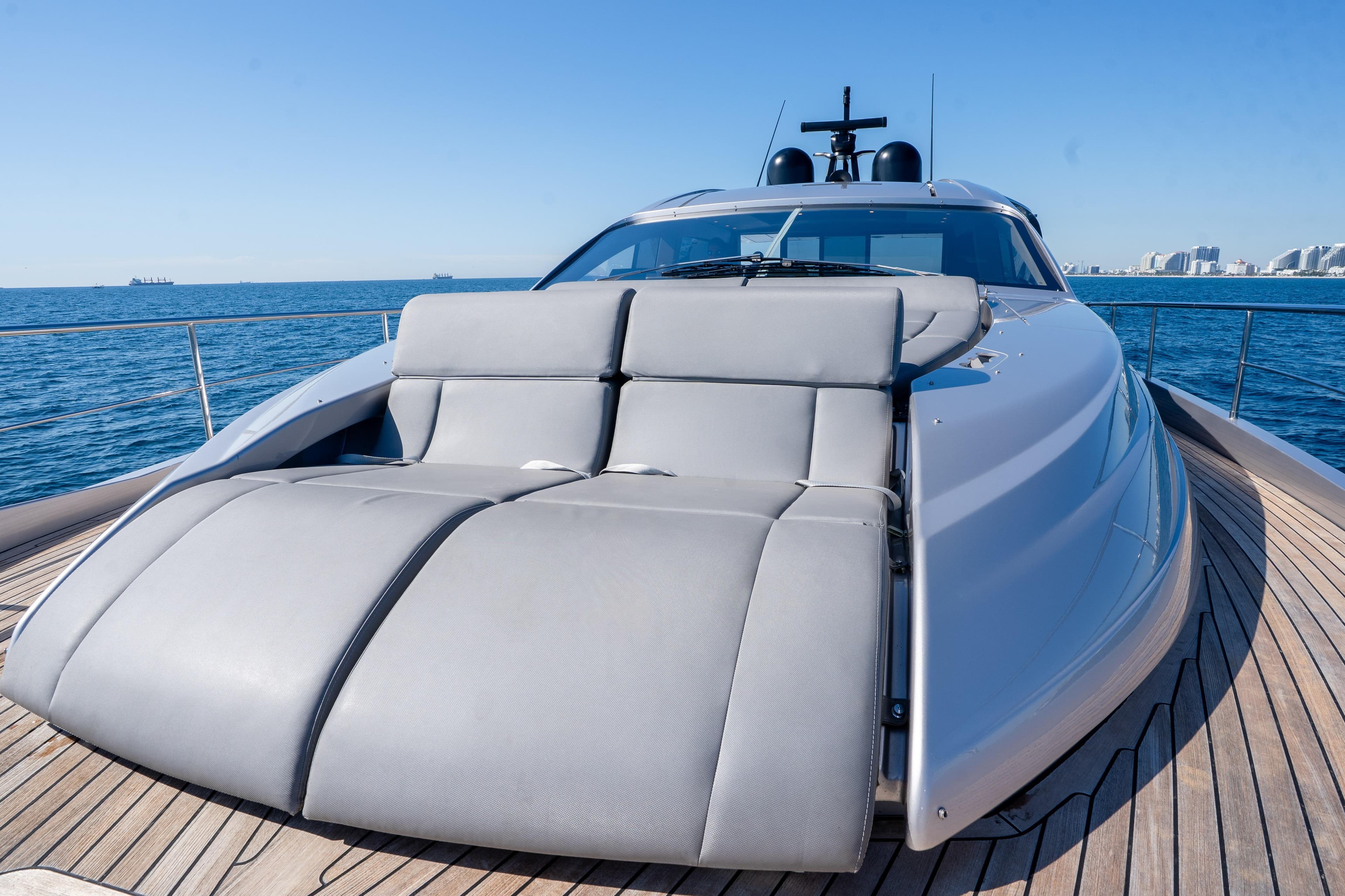 Luxurious 2024 Pershing 7X yacht with sleek design and spacious deck, cruising on open sea.