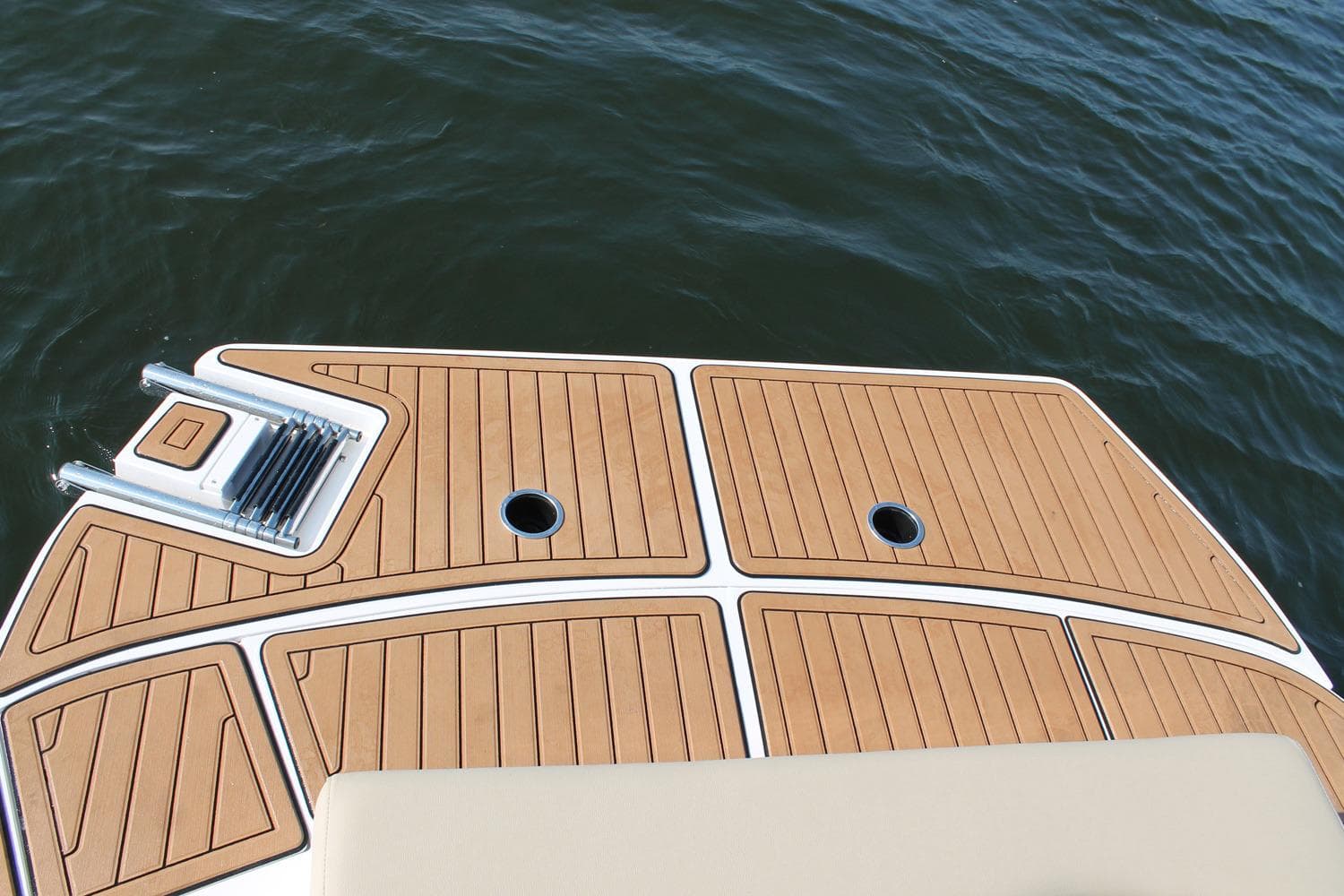 Manufacturer Provided Image: 2017 Starcraft Star Step 221 I/O boat swim platform with teak flooring.