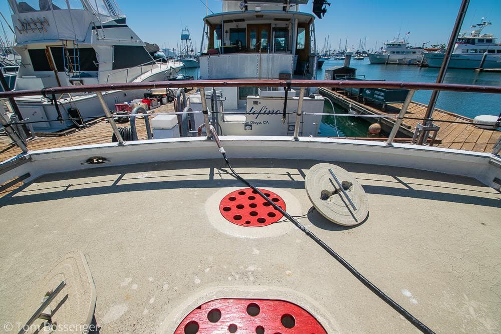 1975 Blanchard Passenger Sportfisher docked at marina, showcasing deck and nautical equipment.