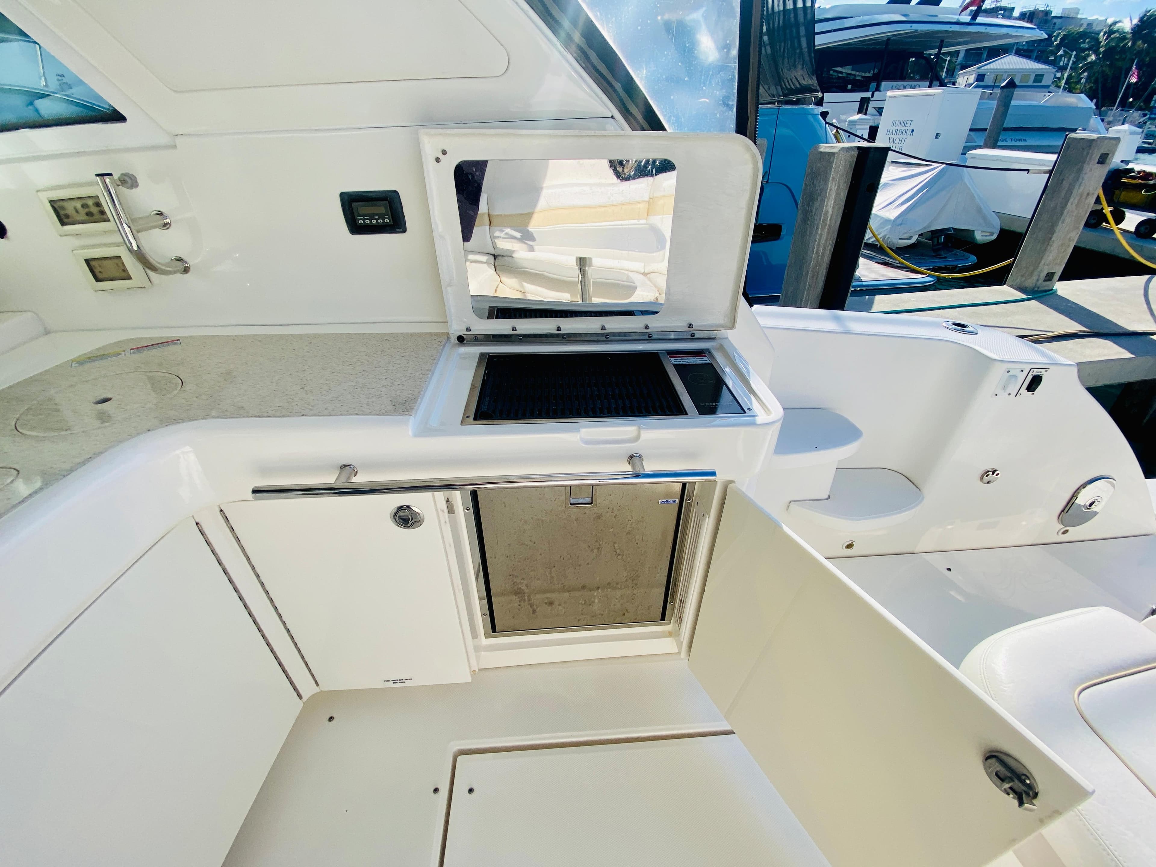 Outdoor kitchen area on a 2010 Sea Ray 450 Sundancer yacht.