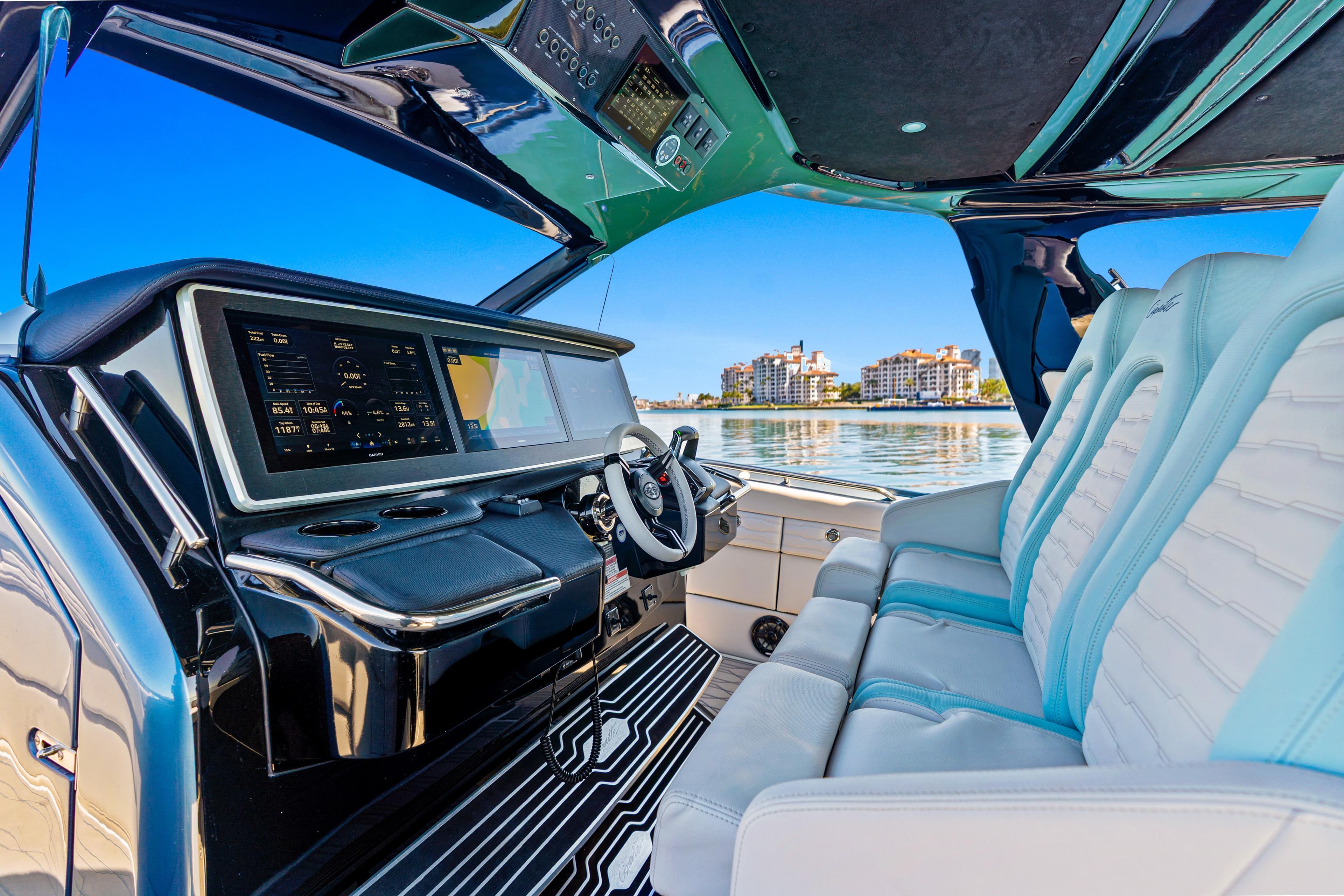 2024 Cigarette 42' Auroris luxury boat interior with advanced dashboard and plush seating.