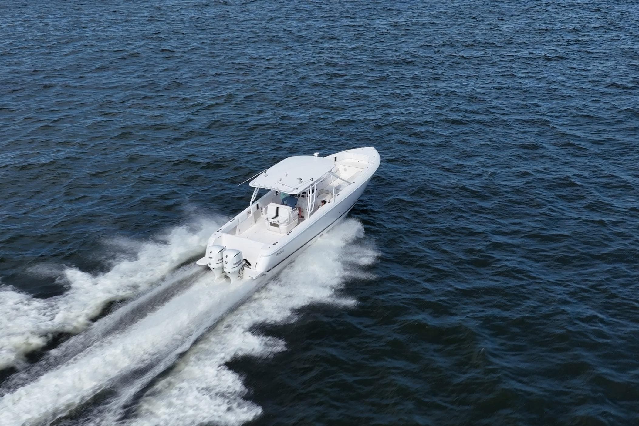 2011 Intrepid 400 Center Console boat cruising on open water.