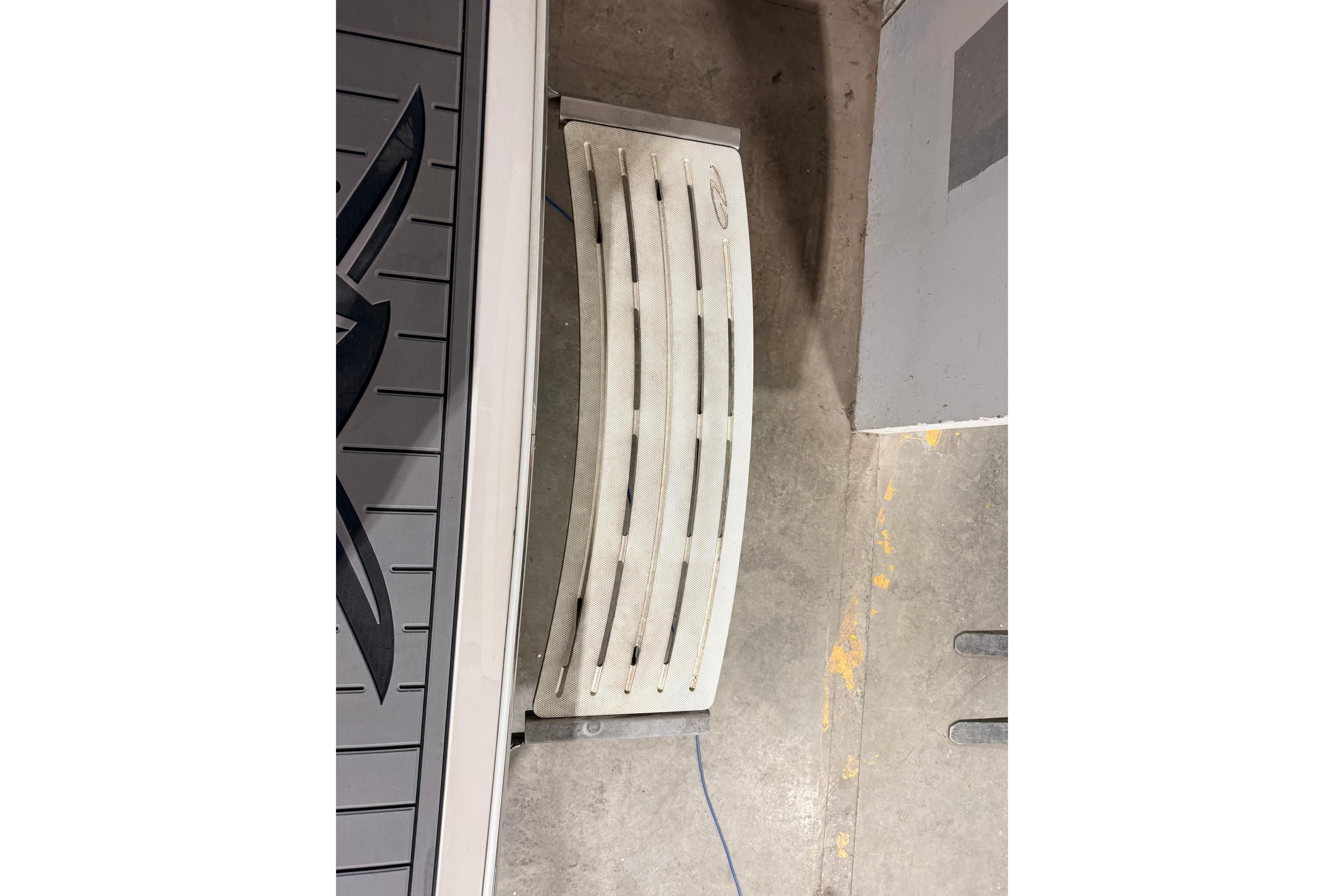2019 Regal 42 Grande Coupe boat swim platform in a garage setting.