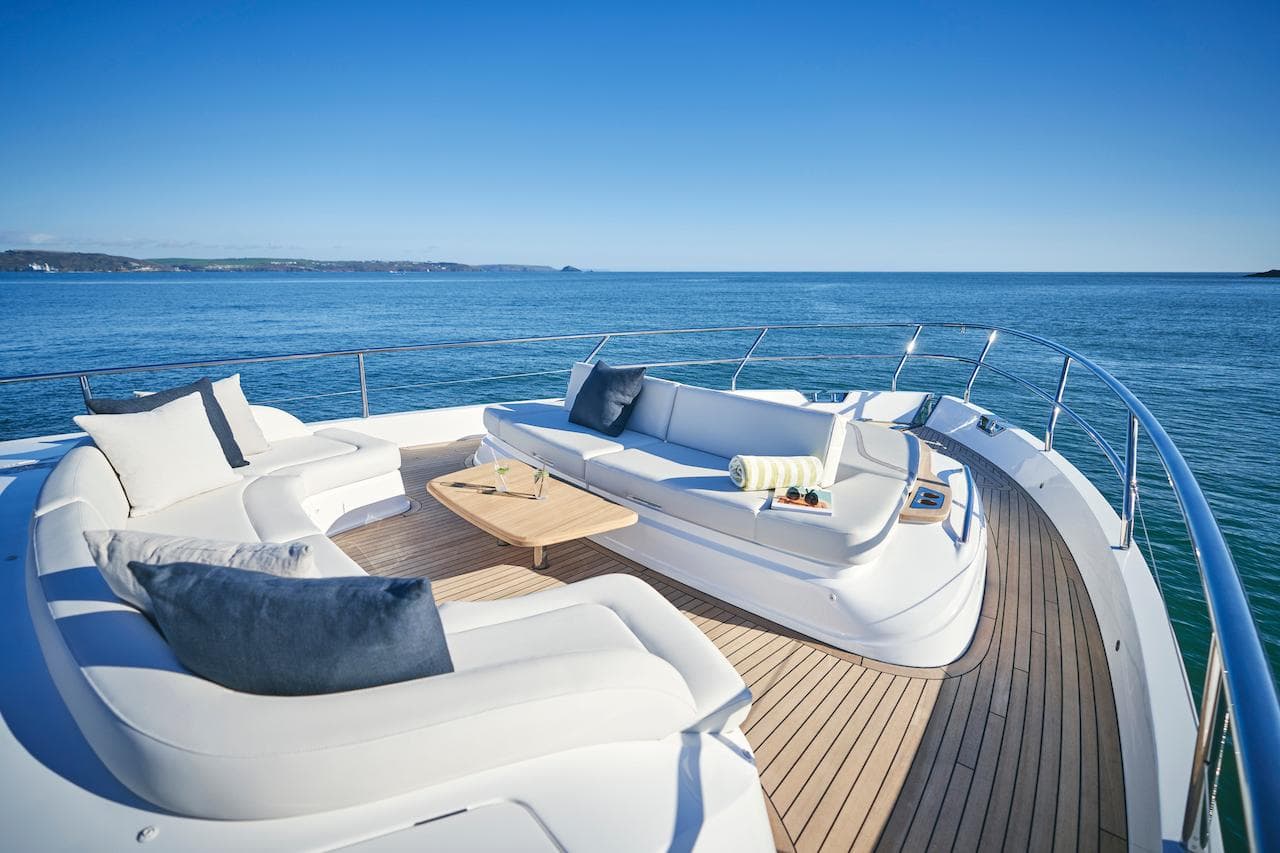 Luxurious 2025 Princess Y72 Motor Yacht with elegant deck seating and ocean view.