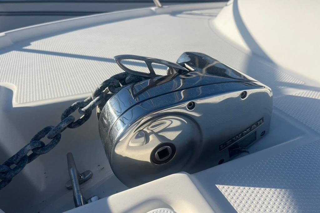Anchor windlass on 2013 Cutwater C-28 boat deck, featuring a sturdy chain mechanism.