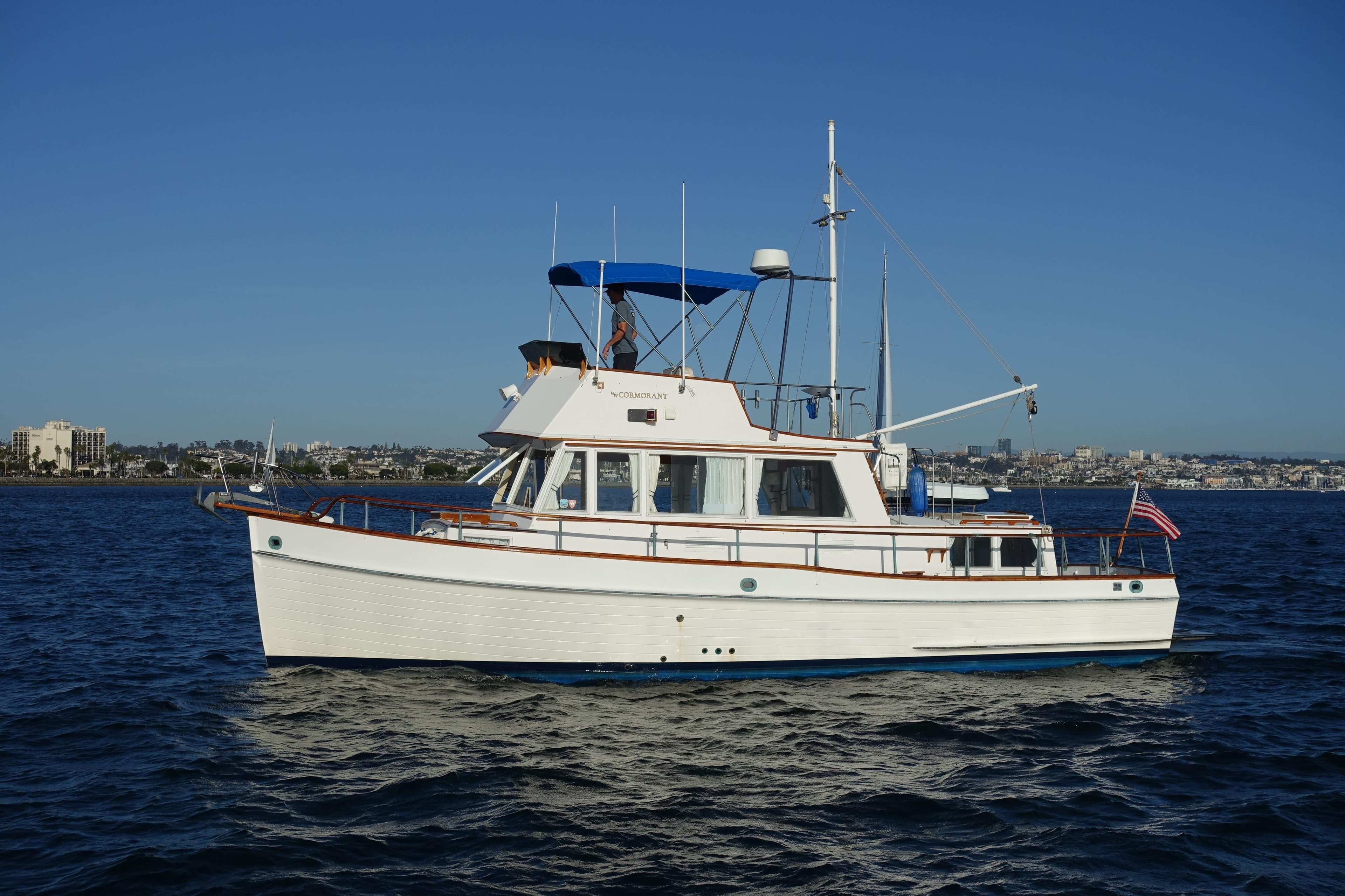 1979 Grand Banks 36 Classic yacht cruising on calm blue waters.