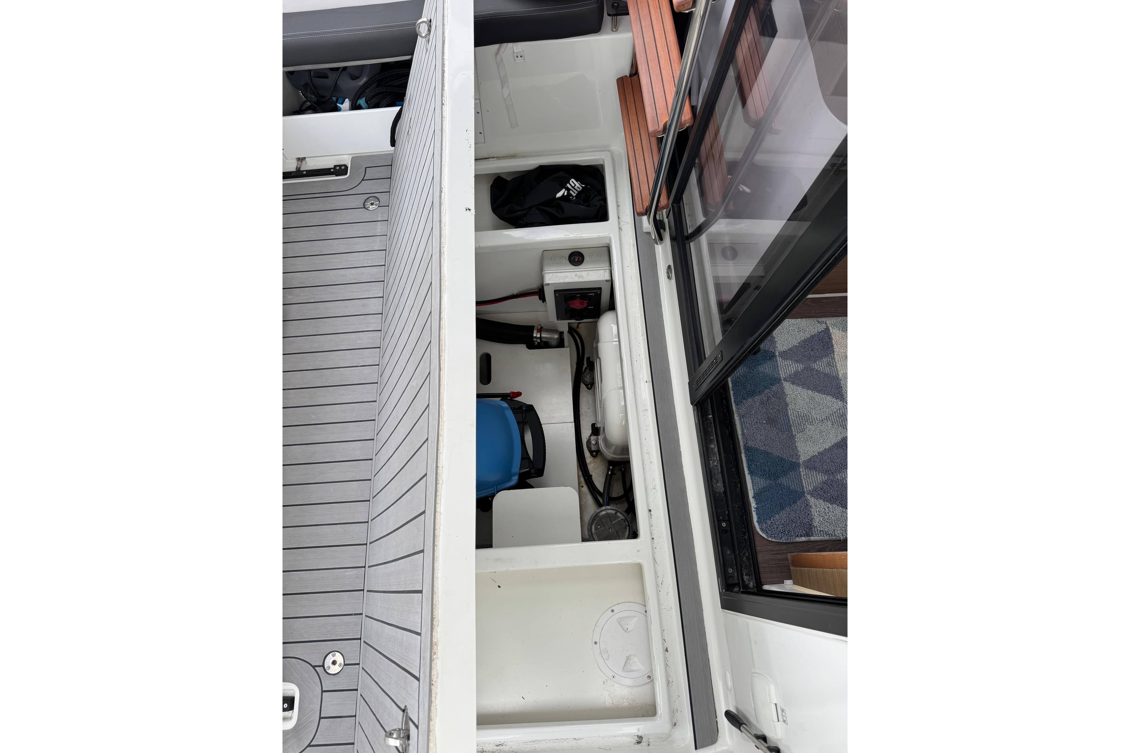 2022 Jeanneau NC Weekender 1095 boat interior storage compartment view.