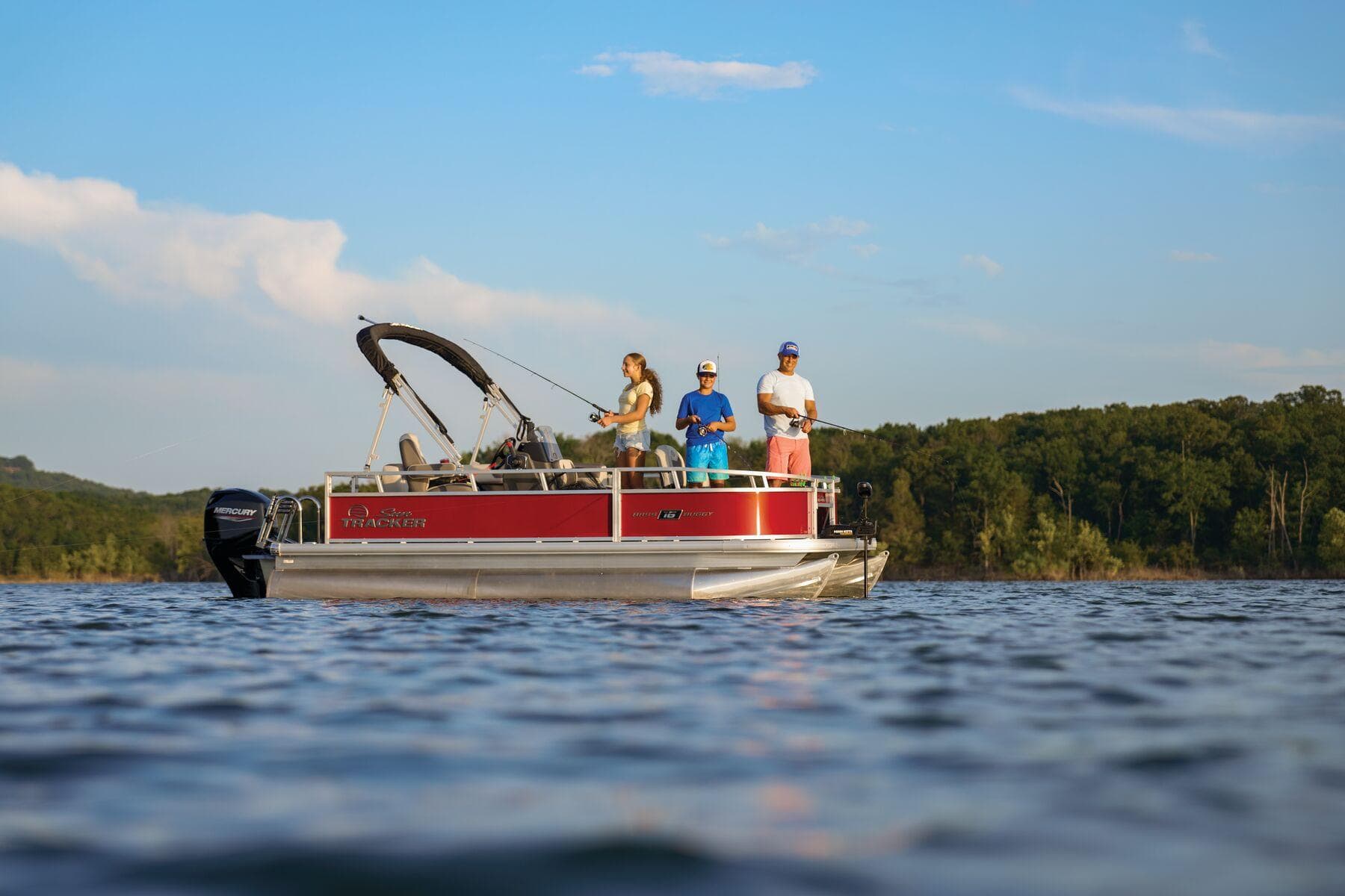Manufacturer Provided Image: 2026 Sun Tracker Bass Buggy 16 XL Select pontoon boat on a scenic lake.