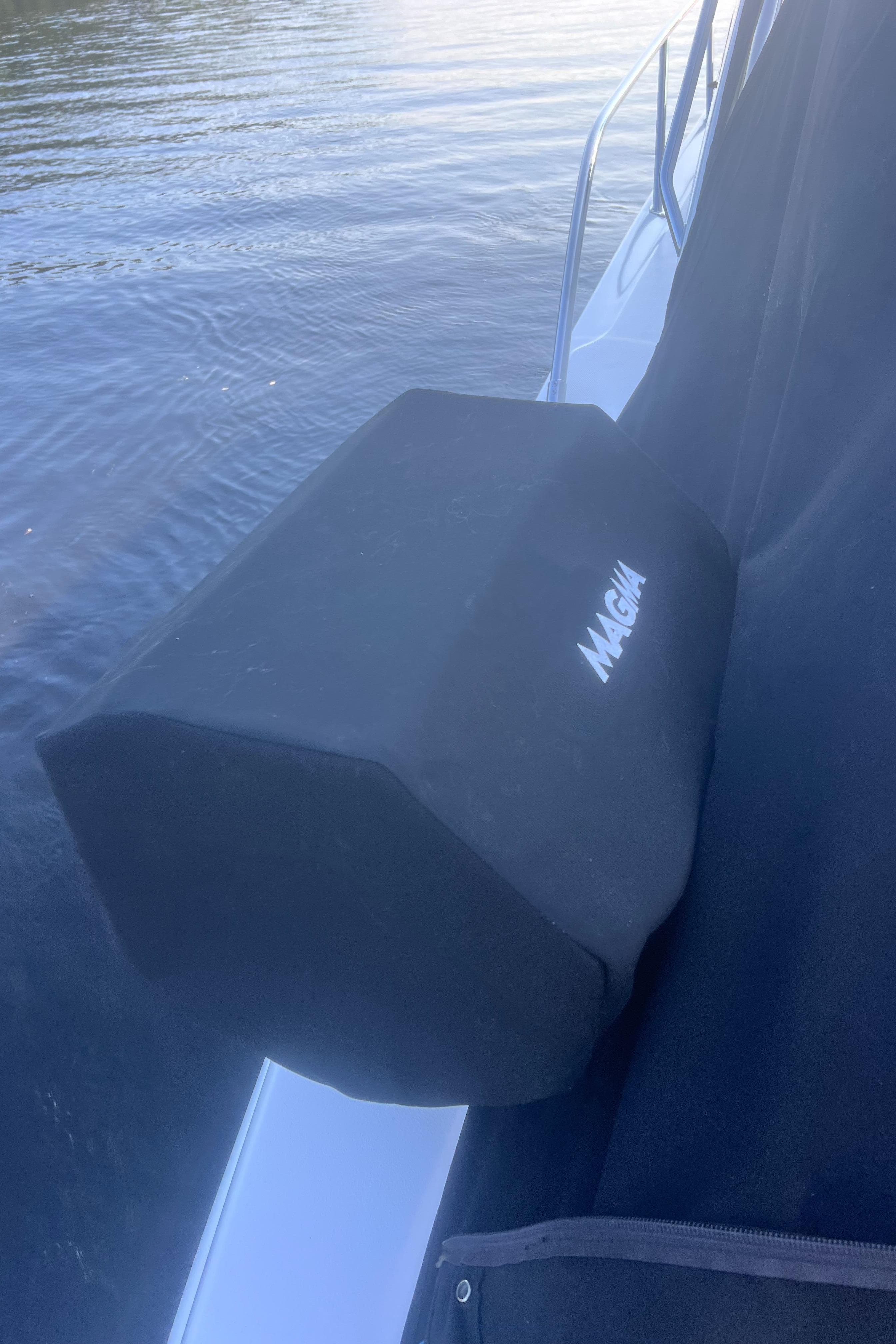 2000 Sea Ray 460 Sundancer with protective cover on calm water.