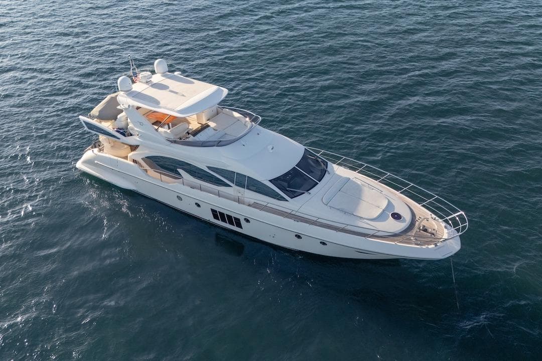 Luxury 2012 Azimut Evolution yacht cruising on open water.