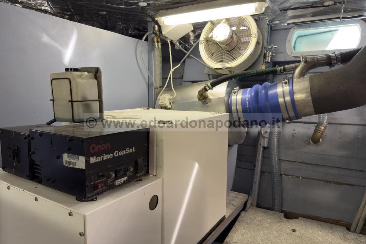 Engine room of 1973 Cantieri di Pisa Atlas yacht with Onan Marine GenSet.