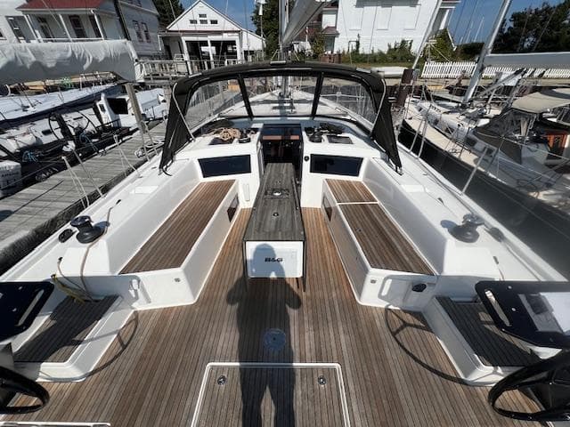 2024 Dufour 470 yacht cockpit with teak decking and modern design.