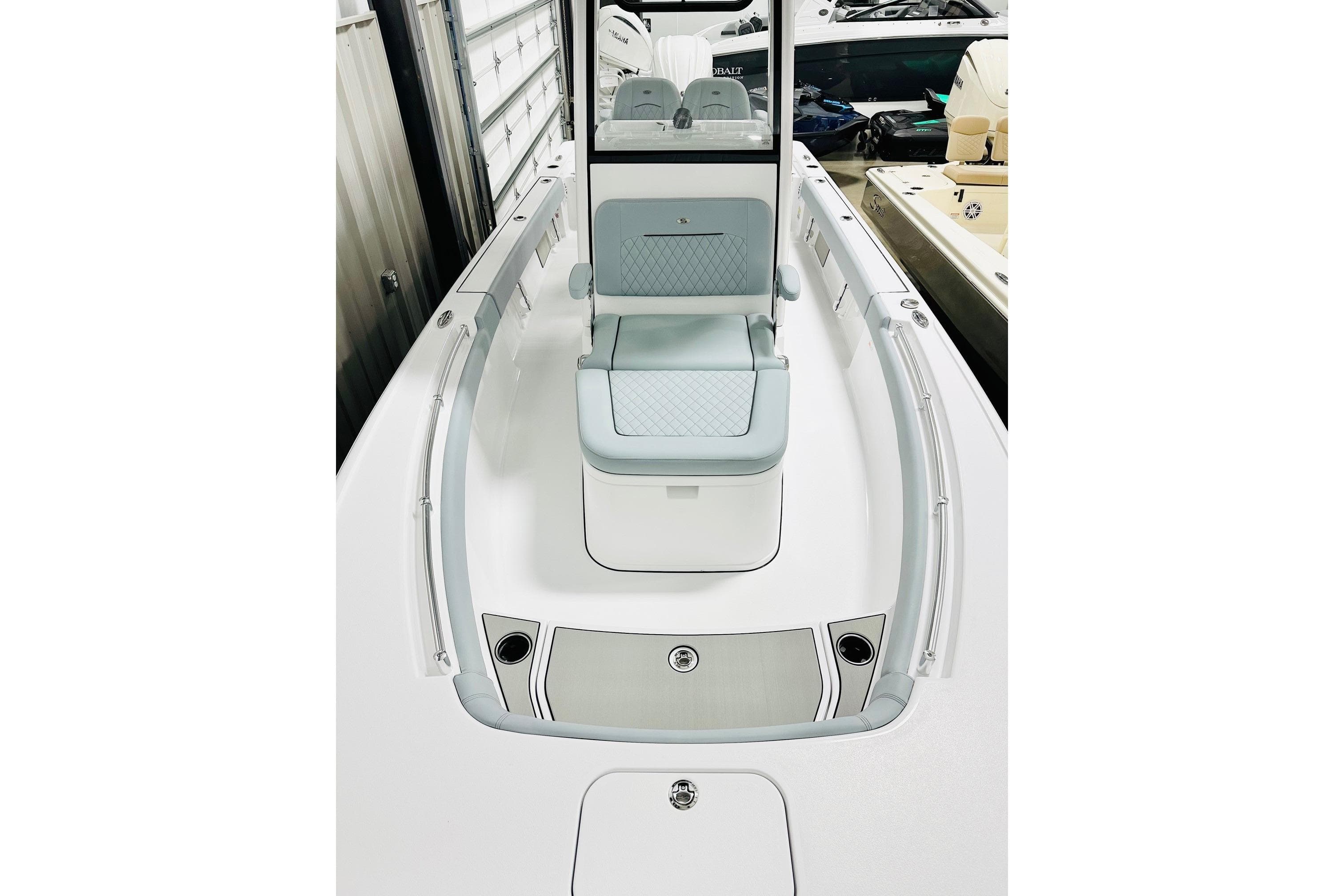 2026 Sportsman Masters 247OE Bay Boat interior with seating and storage compartments.