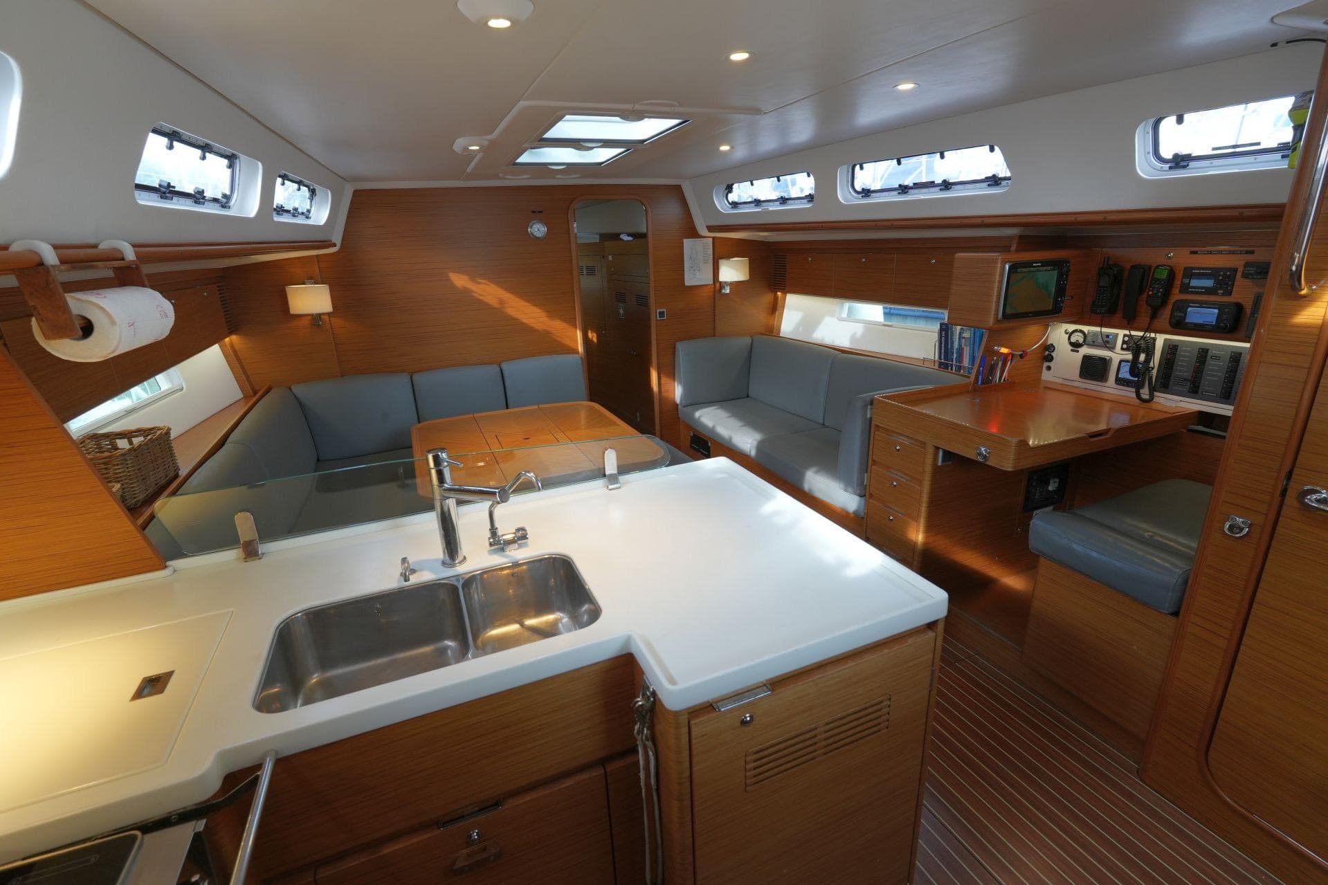 Luxurious interior of 2016 X-Yachts XC-45 MK II sailboat with modern kitchen and seating area.