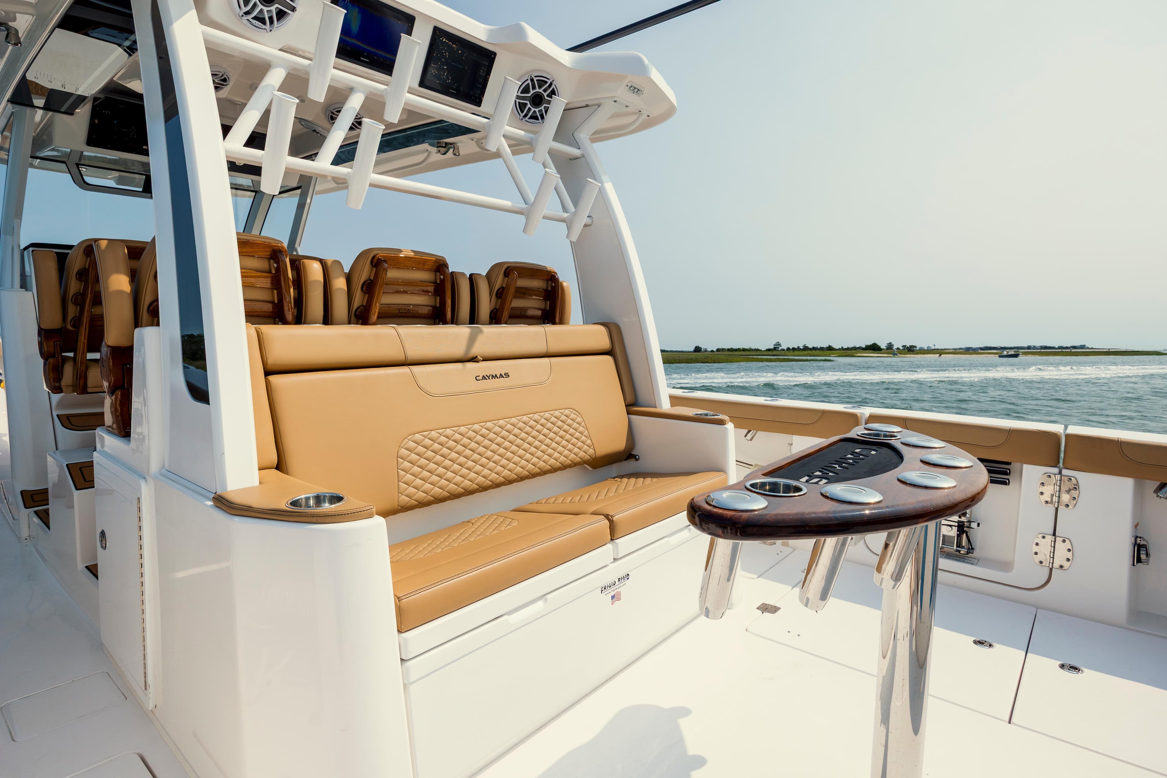 2025 Caymas 44 CT boat interior with luxurious seating and ocean view.