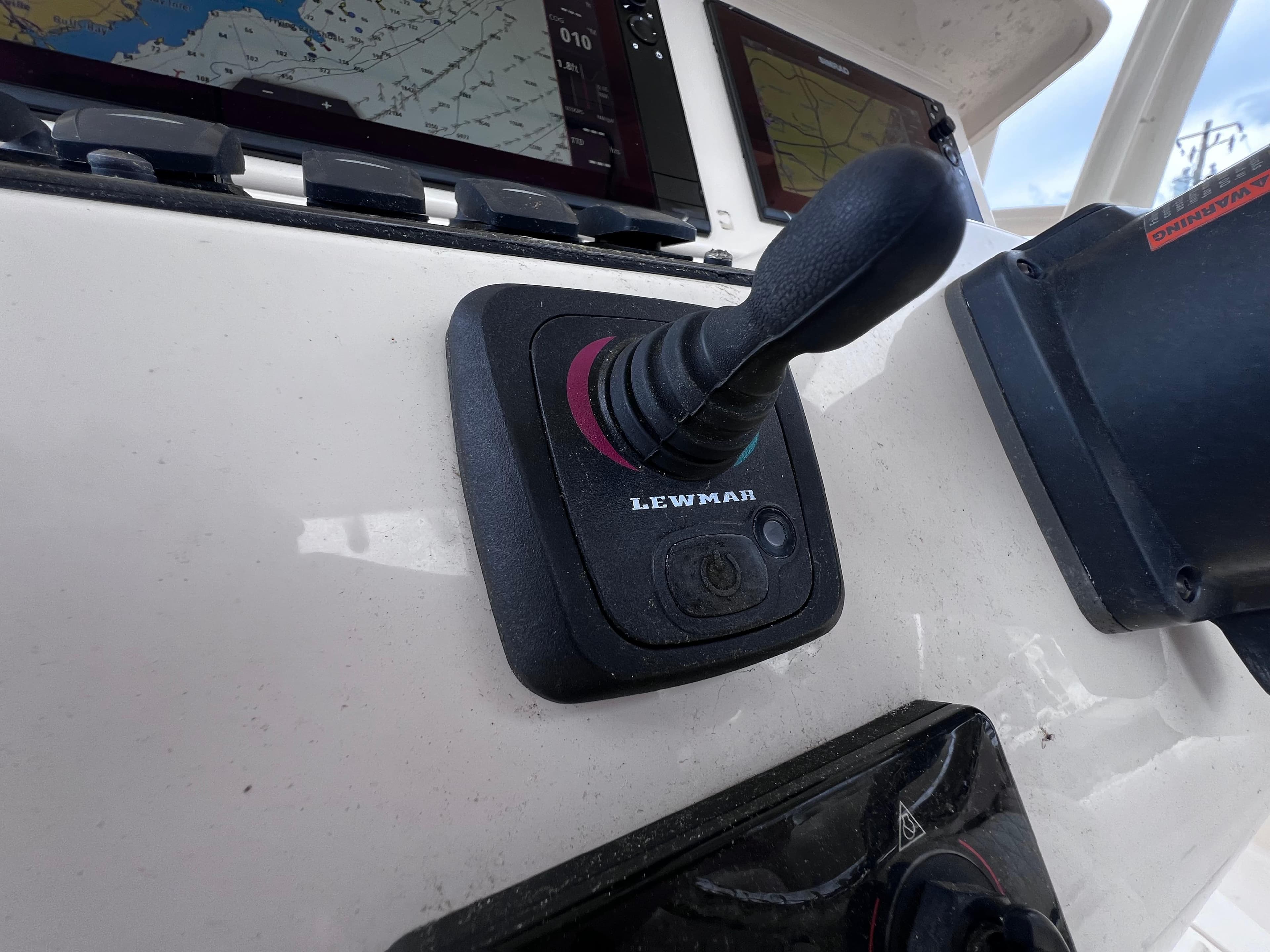 Joystick control on 2015 Grady-White 336 Canyon boat dashboard.