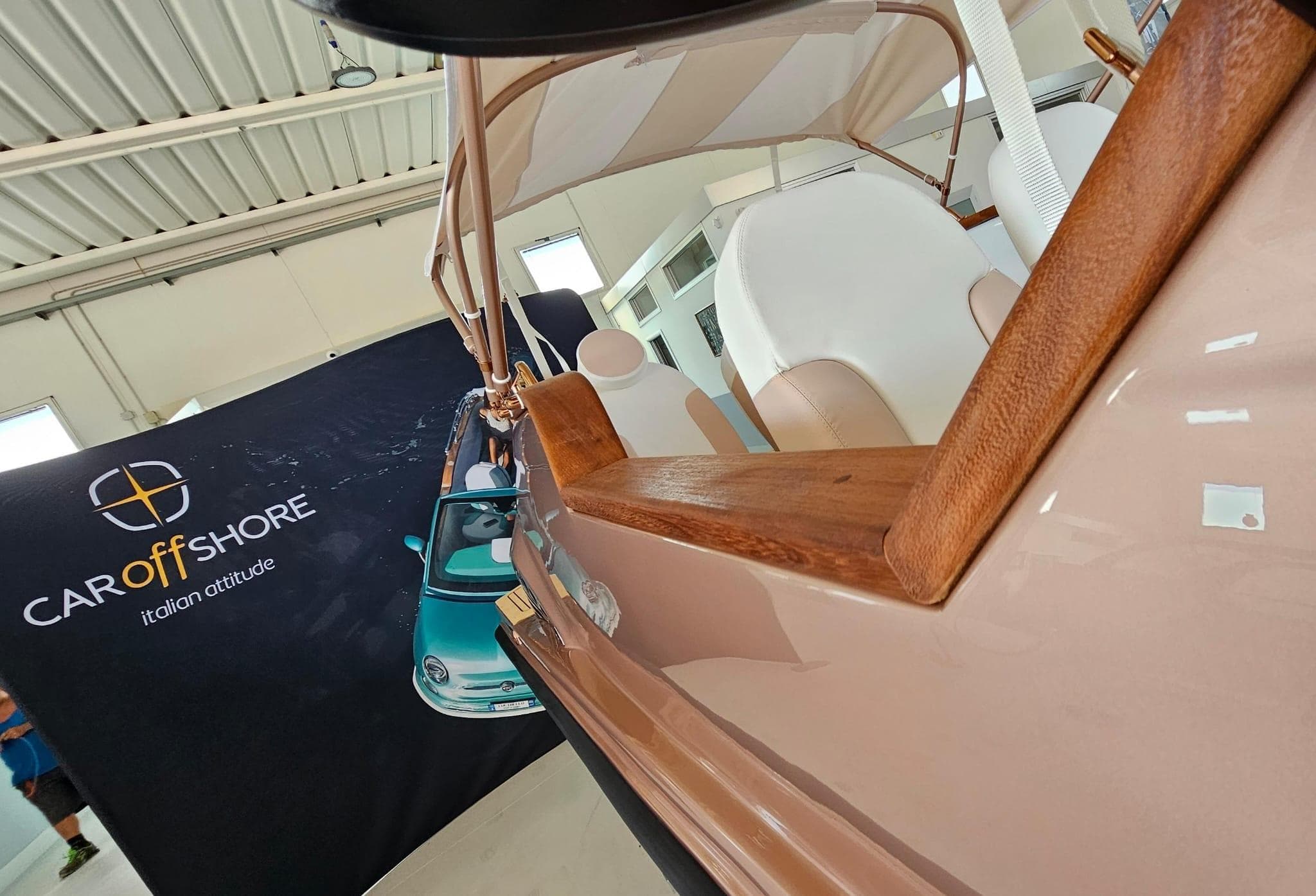 2026 Car Off-shore Fiat 500 Rose Gold with wooden interior detail.