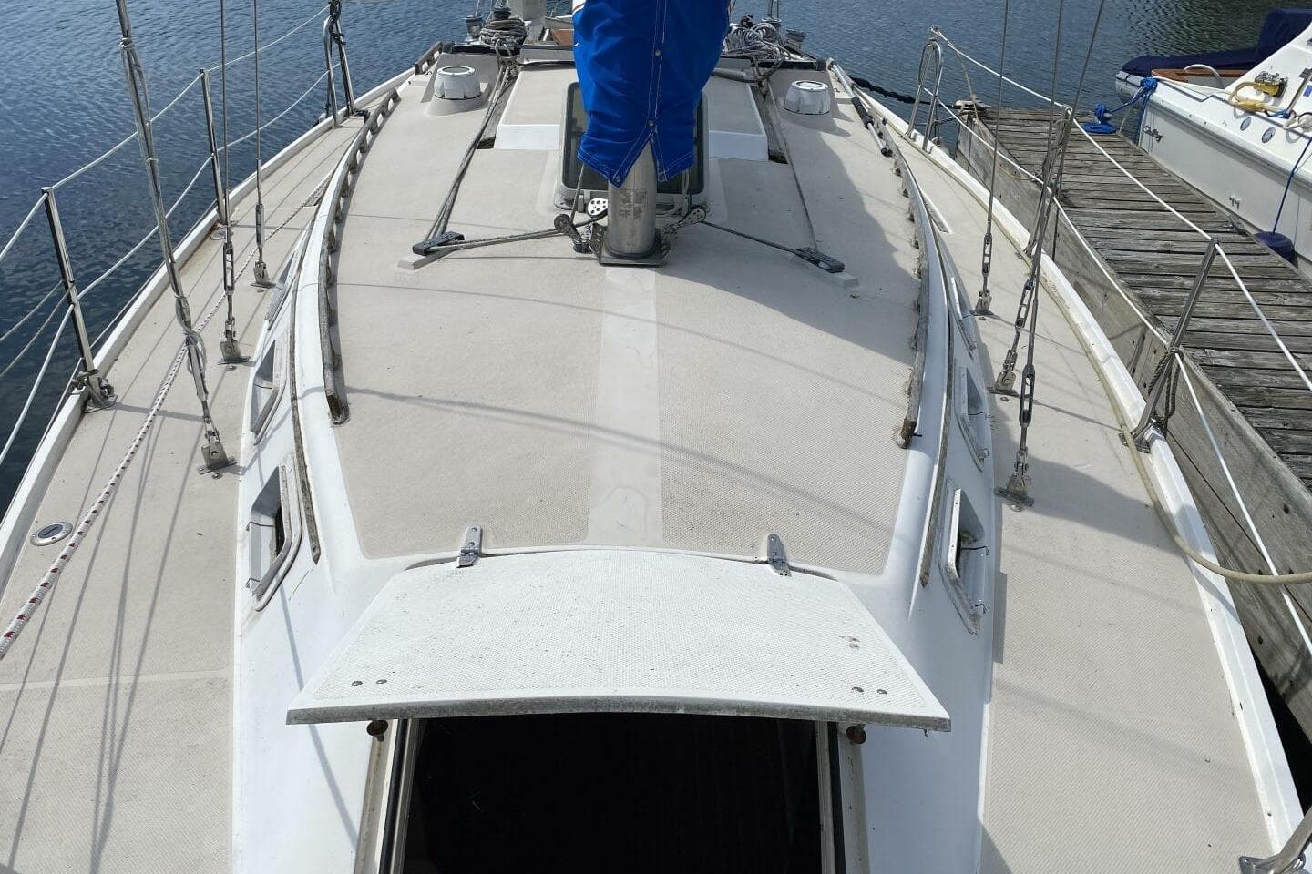 1986 Catalina 34 sailboat deck view, docked at marina.