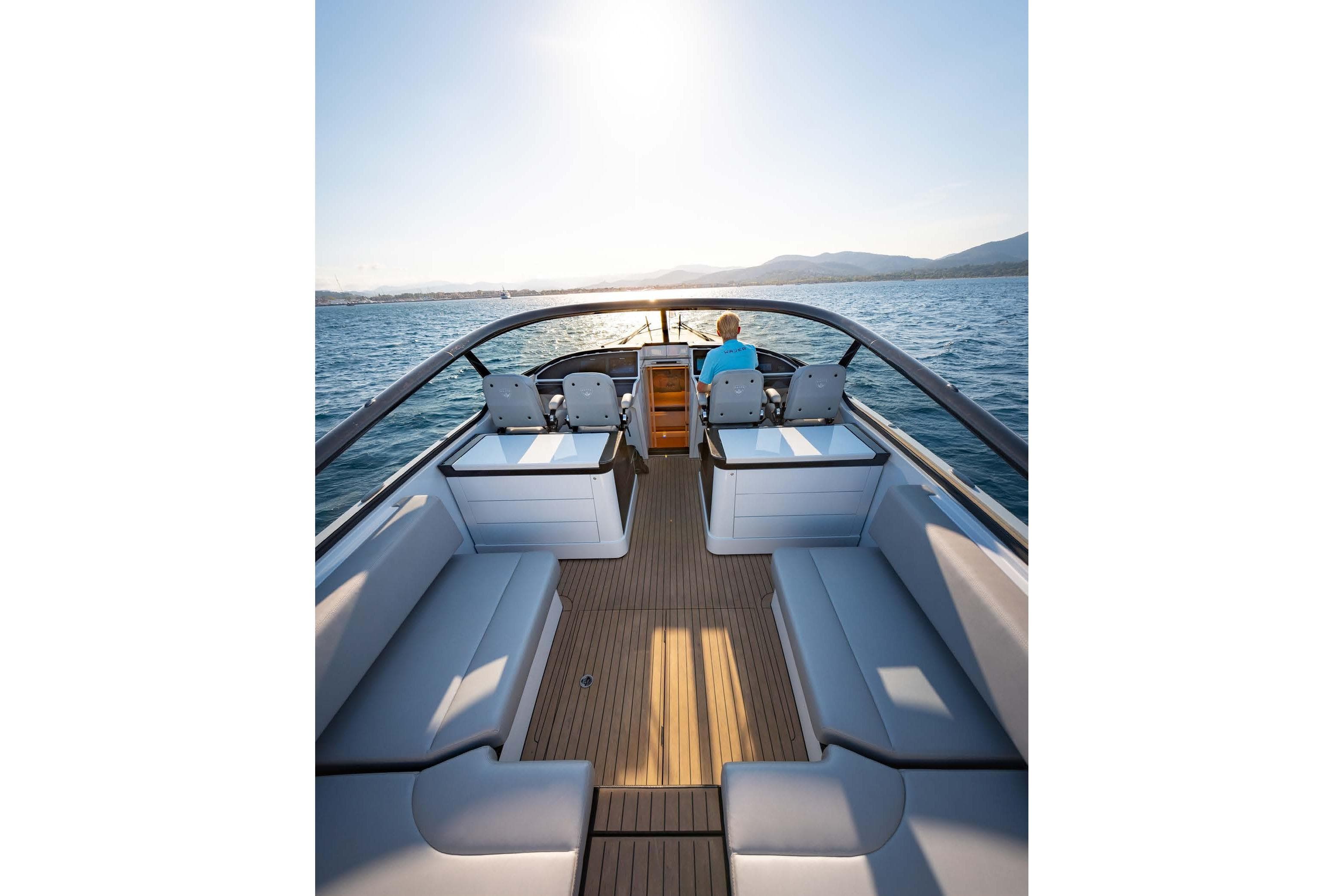 2019 Wajer 55 yacht cruising on open water at sunset.