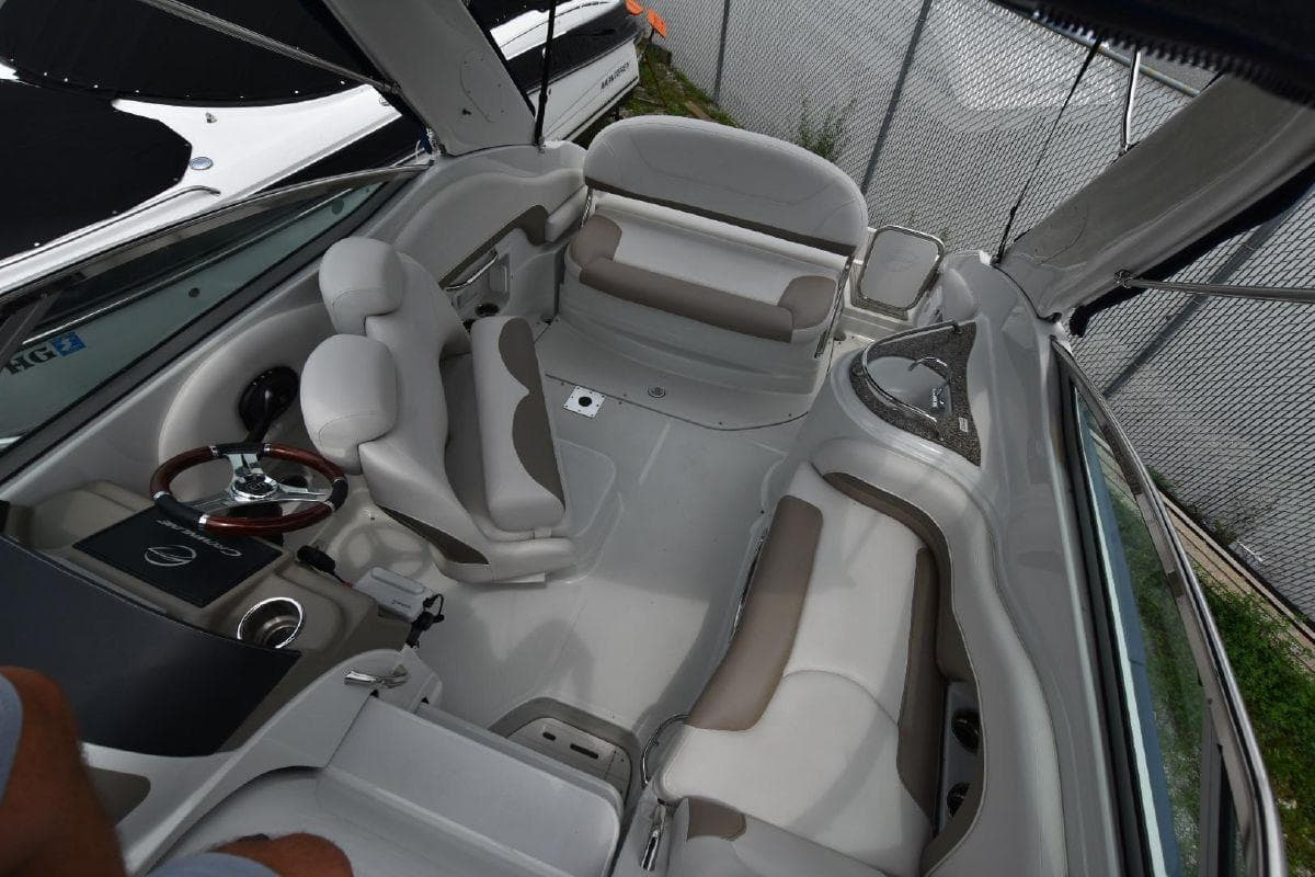 2021 Crownline 264 CR boat interior with white and beige seating.