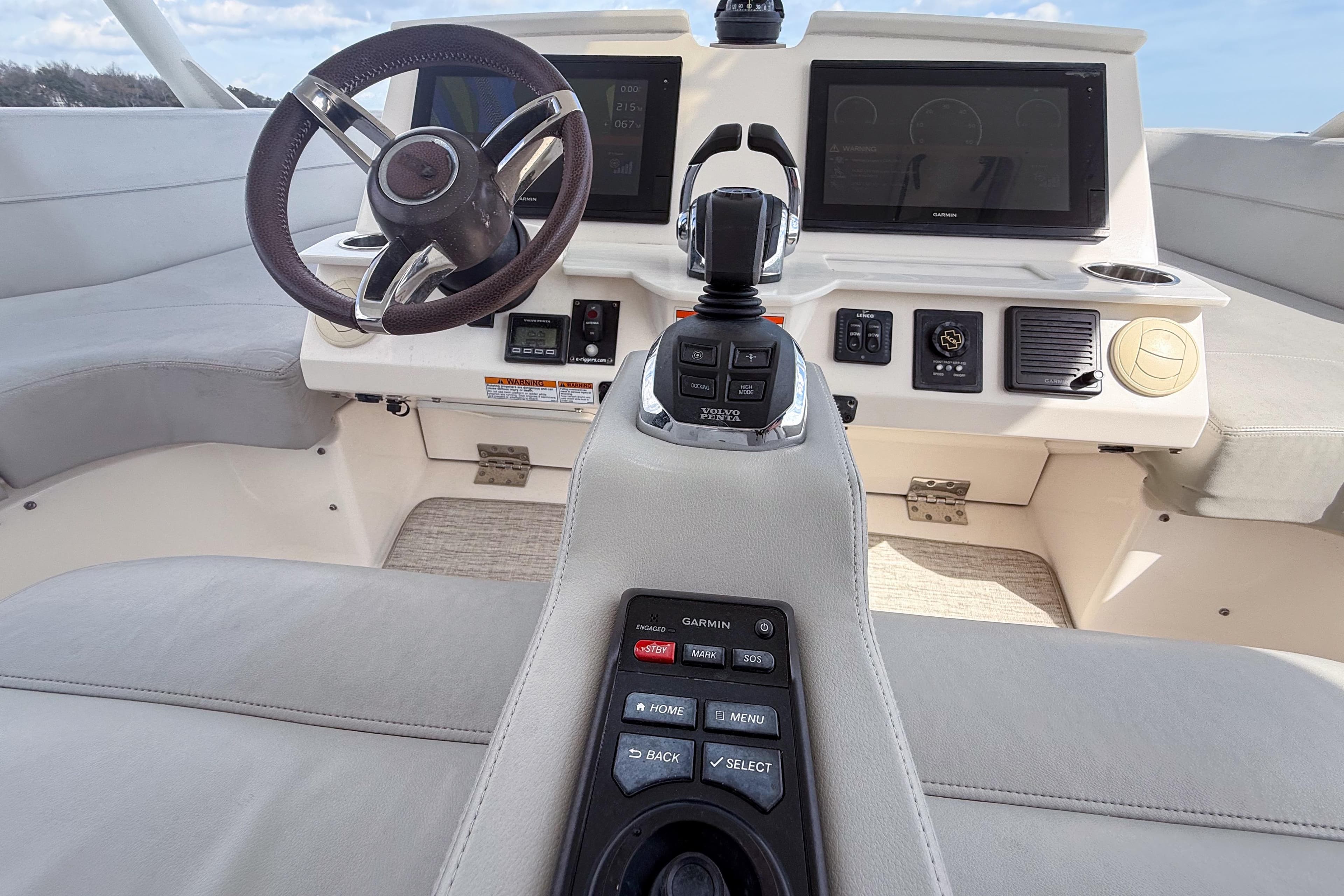 2019 Tiara Yachts F53 Flybridge helm with modern controls and navigation displays.
