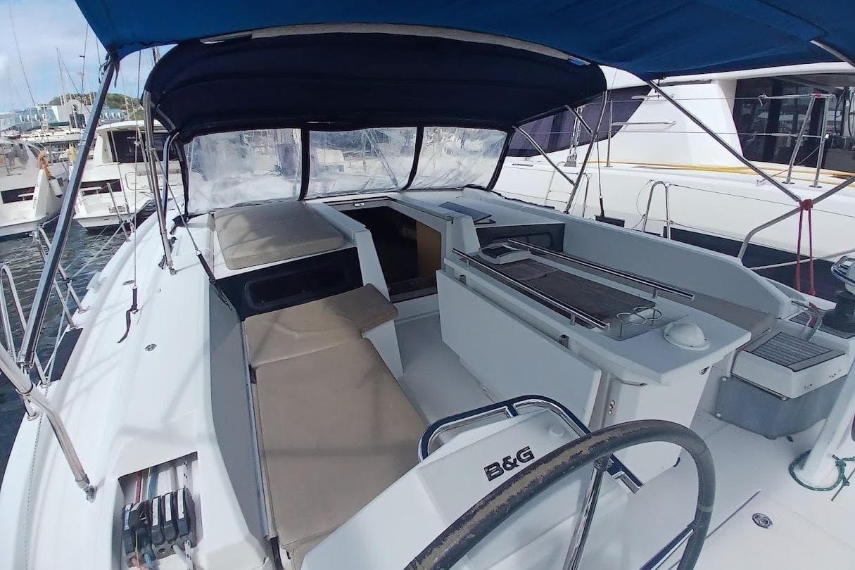 2020 Beneteau Oceanis 46.1 yacht cockpit with seating and navigation equipment.