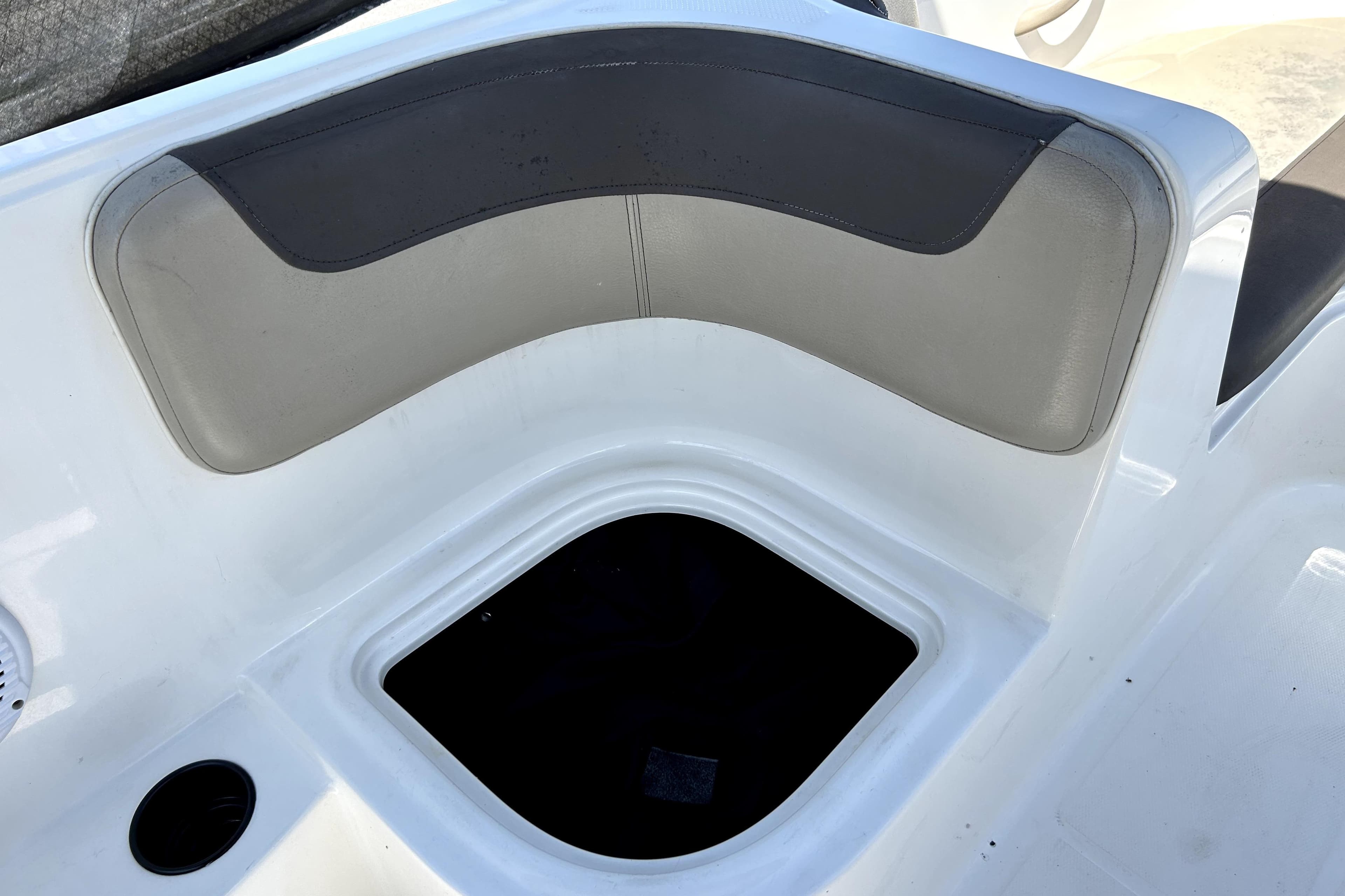 2017 Bayliner Element E16 boat seat with storage compartment.