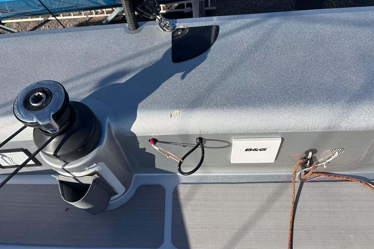 Deck of 2022 One Design Cape 26 sailboat with winch and B&G equipment.