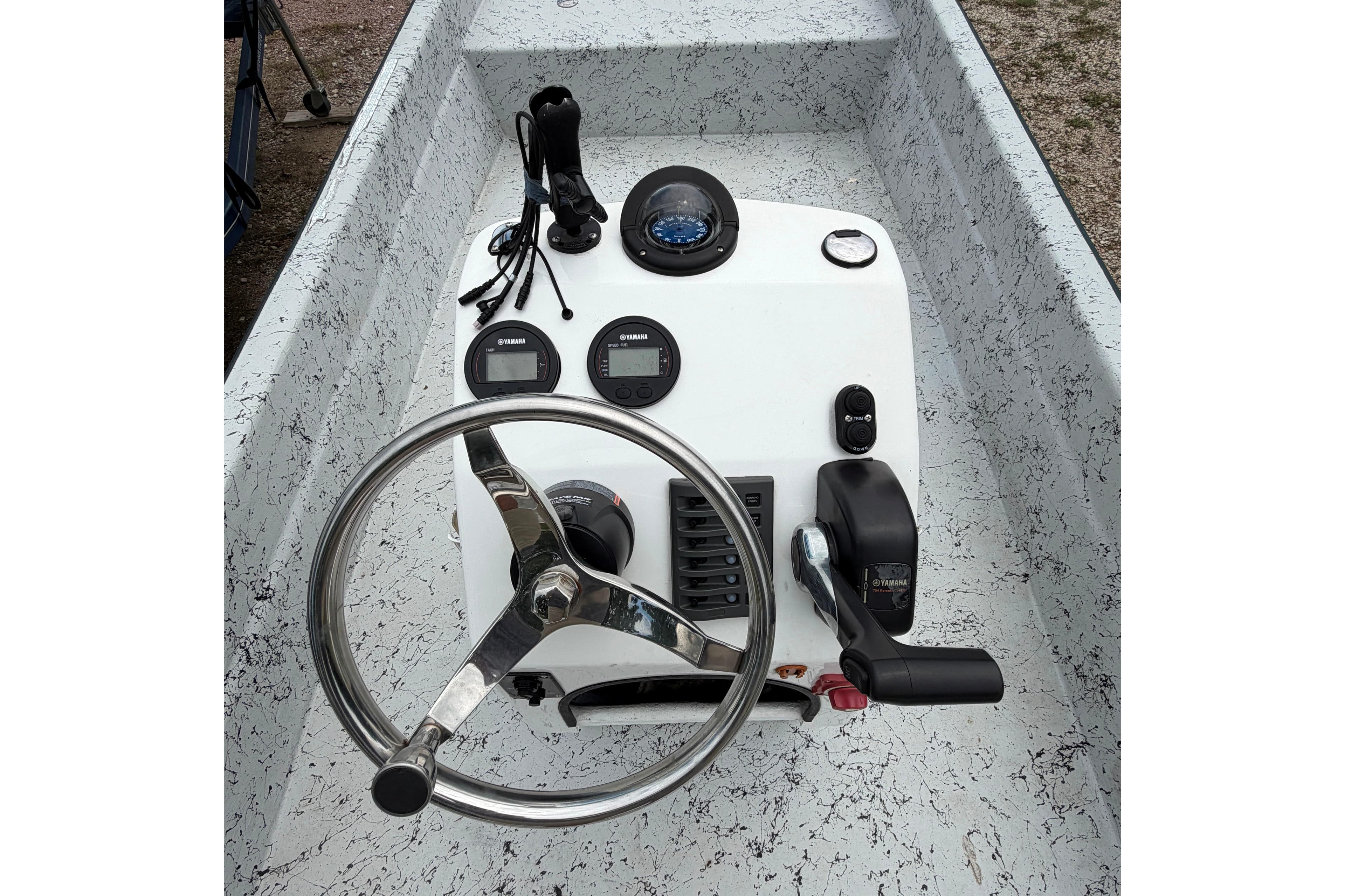 2018 Panga Imemsa W-23II boat console with steering wheel and controls.