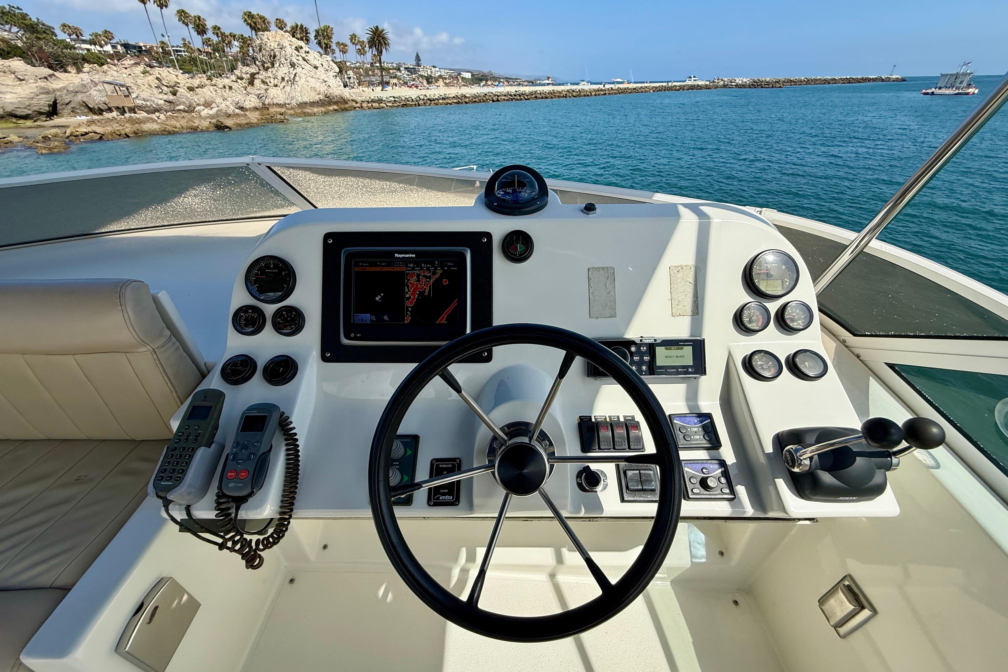 Helm of 2007 Navigator 44 Classic yacht with navigation equipment and ocean view.