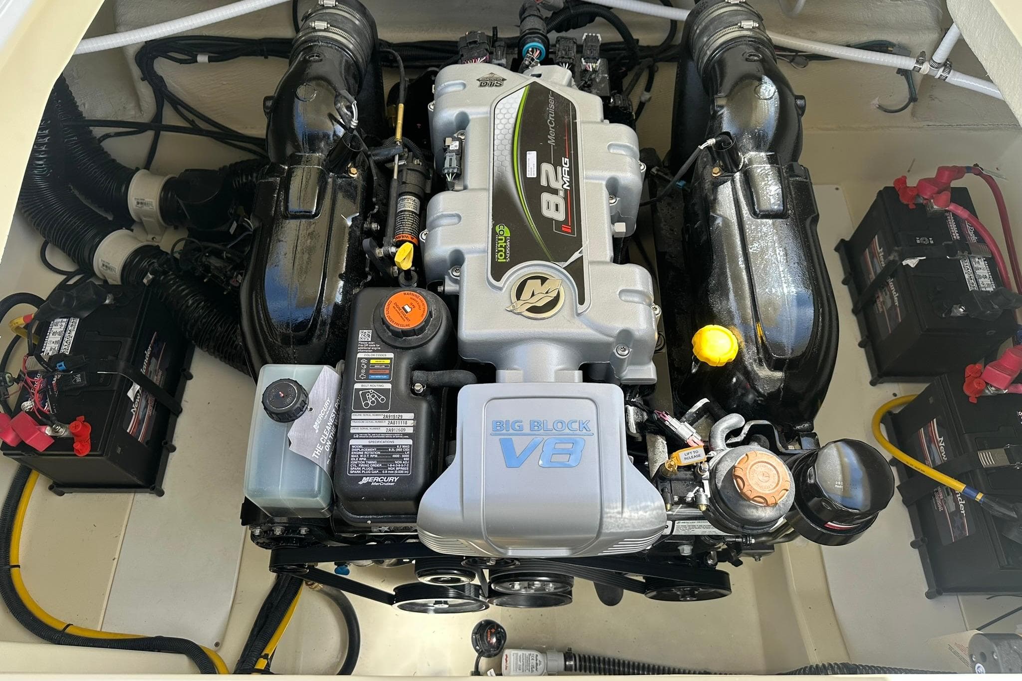 Engine compartment of 2026 Chris-Craft Sportster 28 with powerful V8 engine.