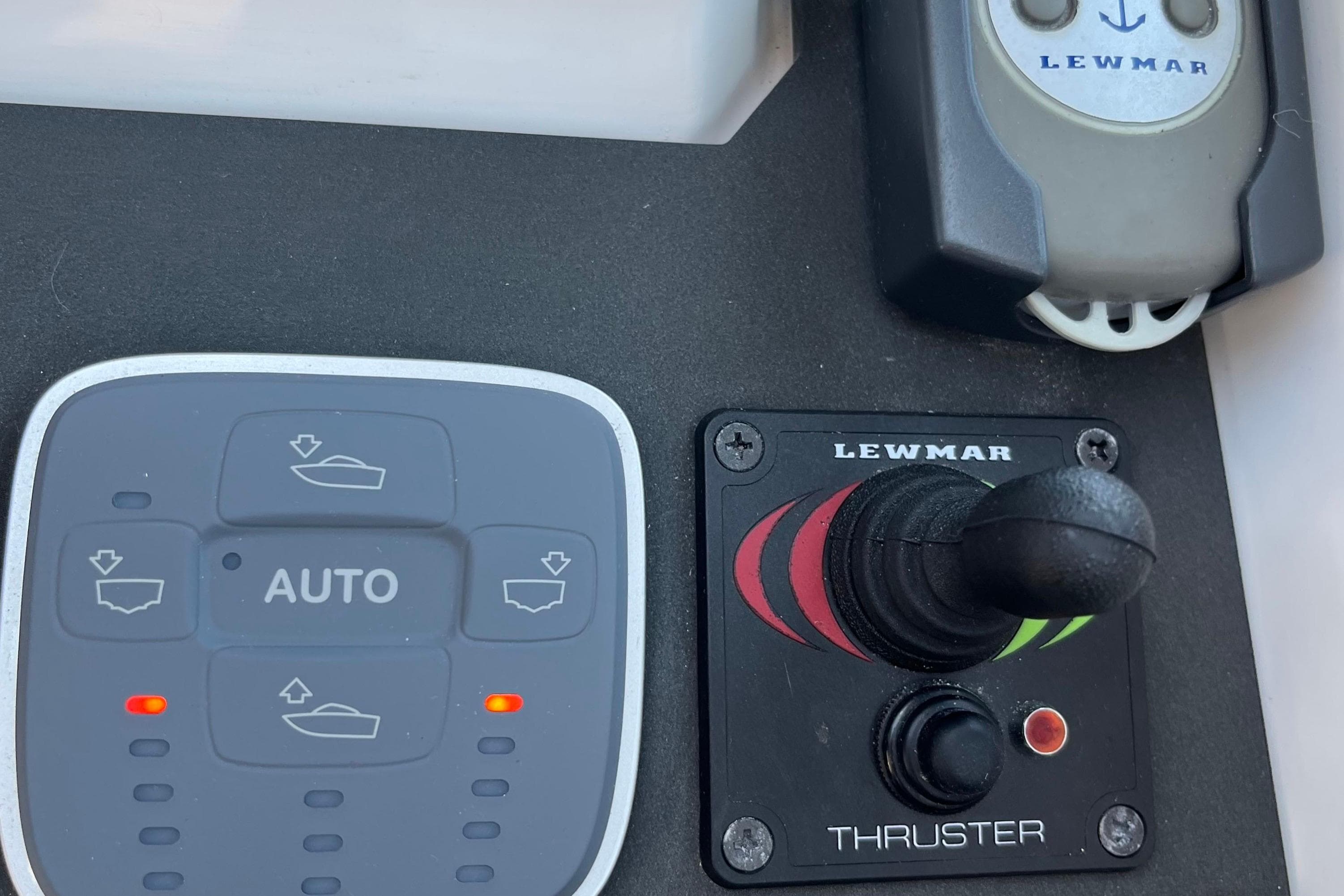Control panel of 2021 XO Boats 270 Explorer with Lewmar thruster joystick.