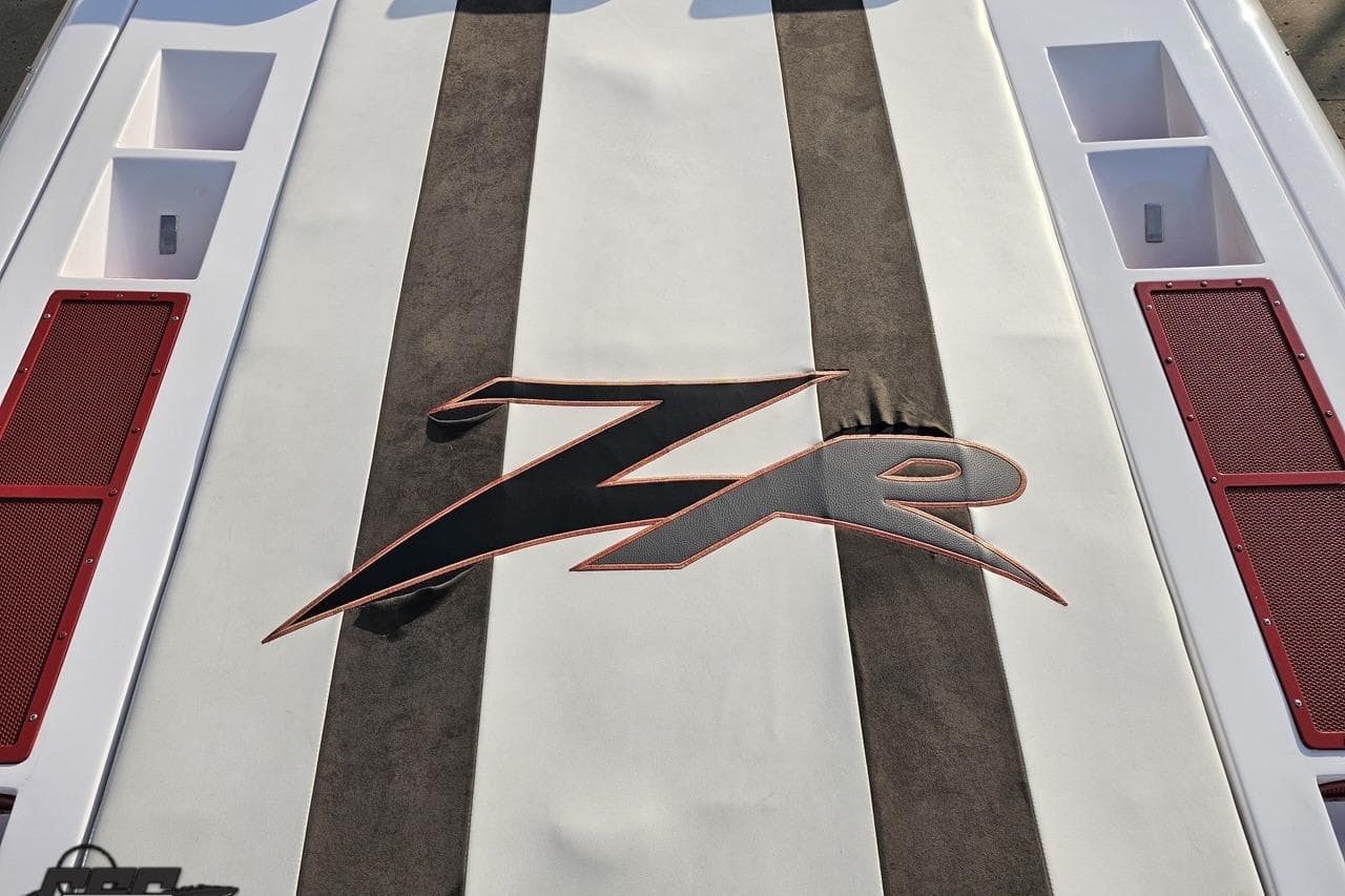2008 Donzi 38 ZR boat deck with bold logo and red accents.