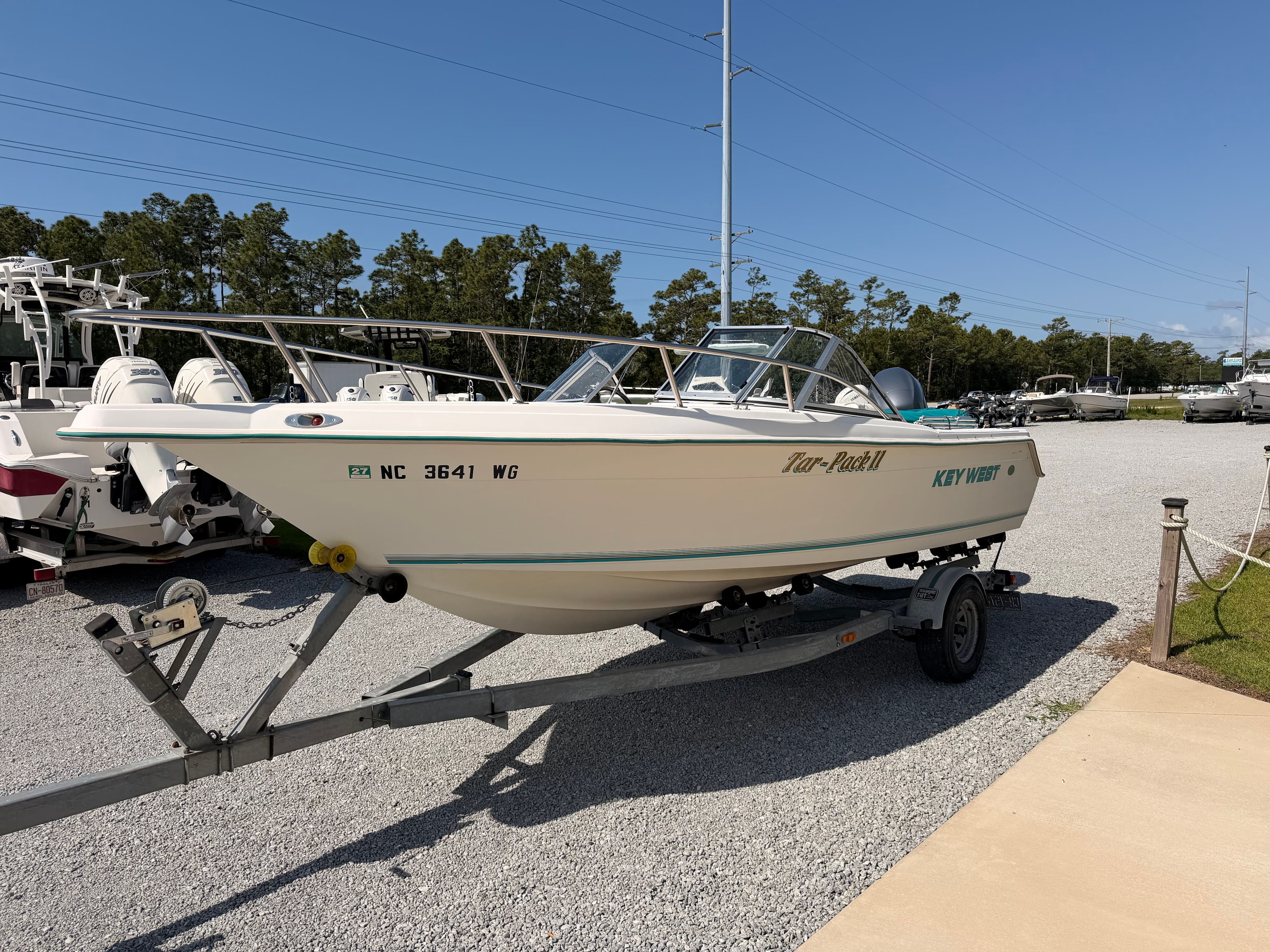 Key West 2020 Dual Console boat on trailer, year 1999.
