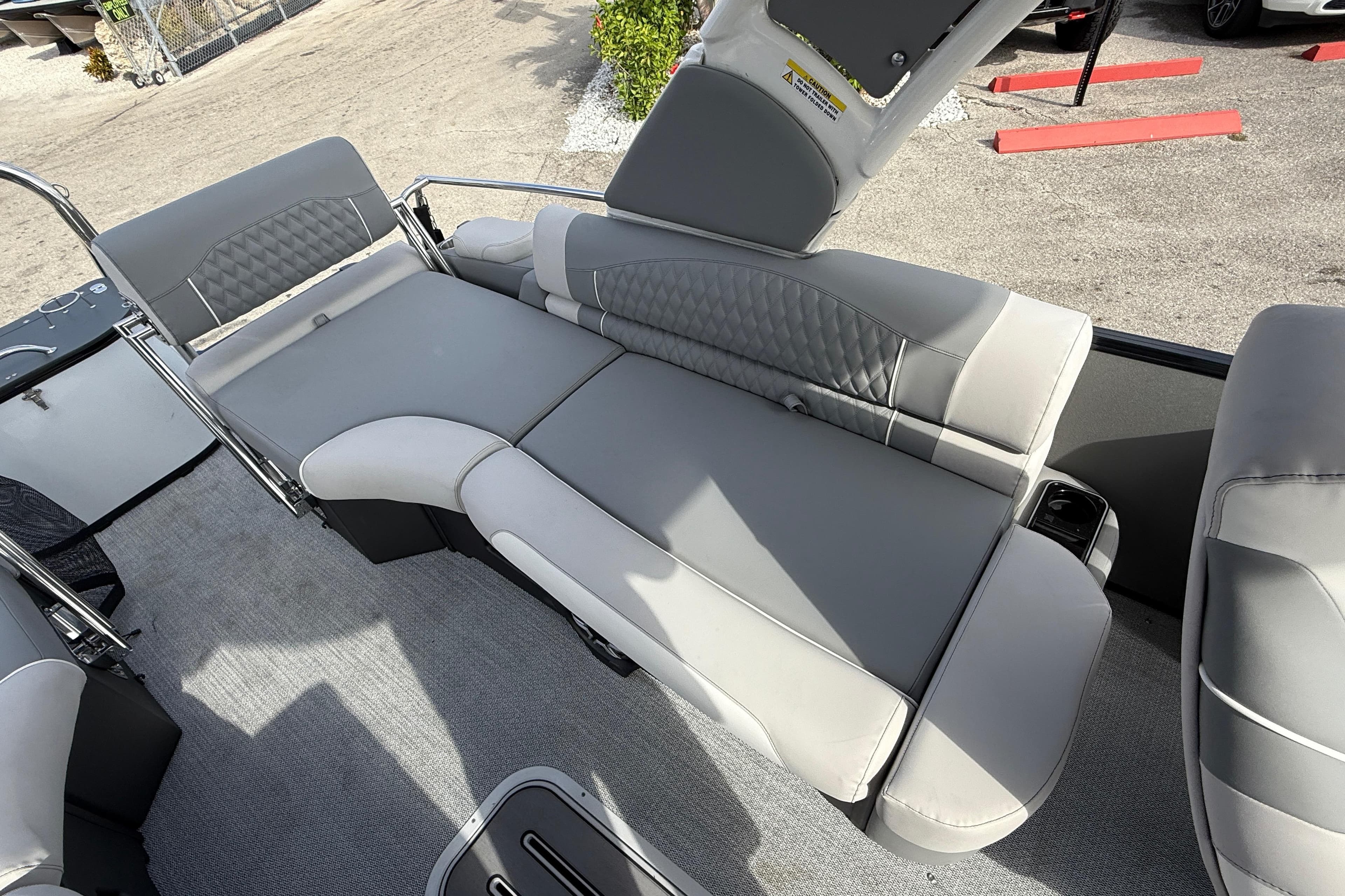 Luxurious seating on 2026 Avalon 2585 Excalibur LTD pontoon boat with Mercury V-10 motor.