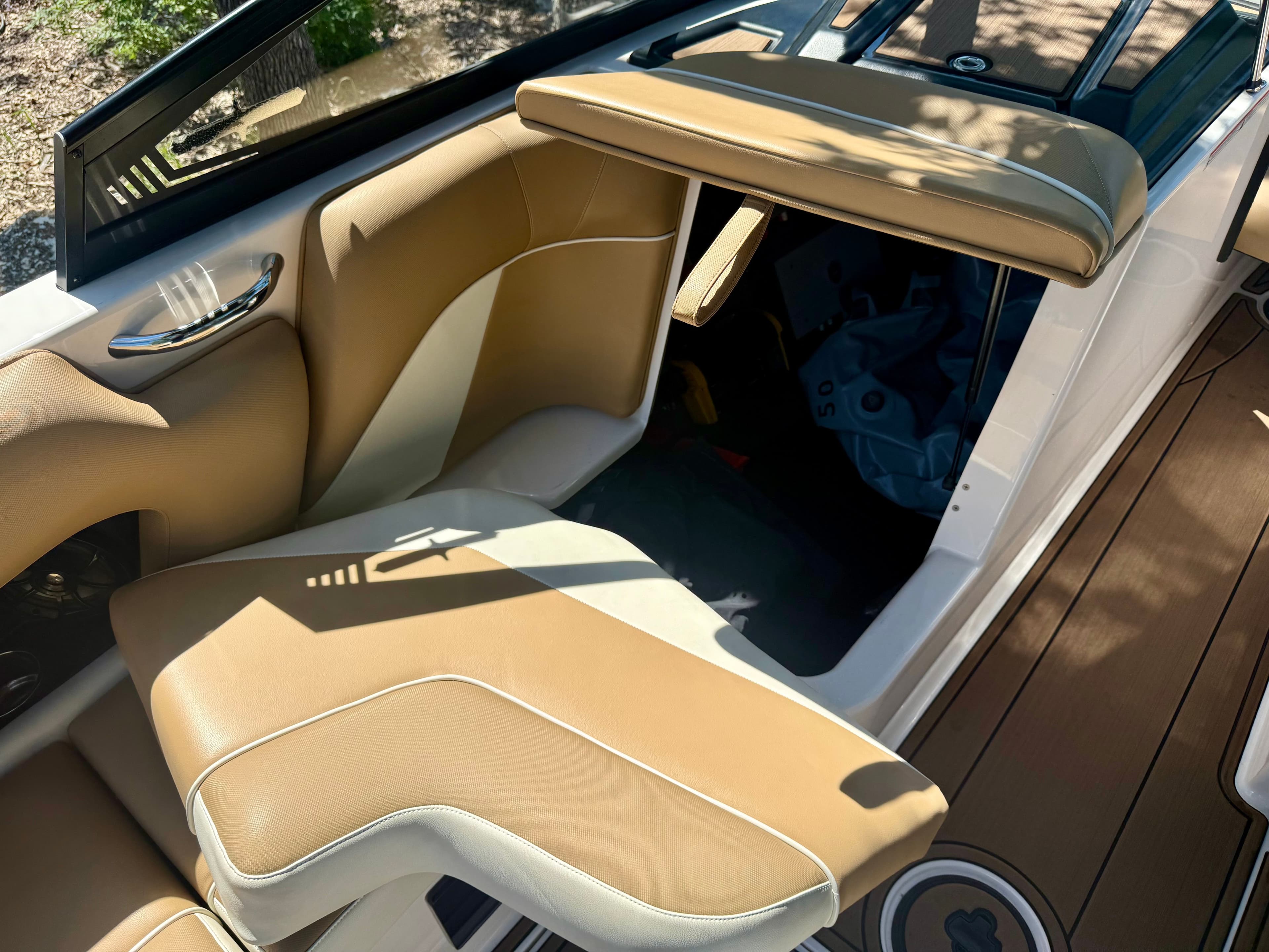 Interior of a 2019 Moomba Craz boat with beige seating.