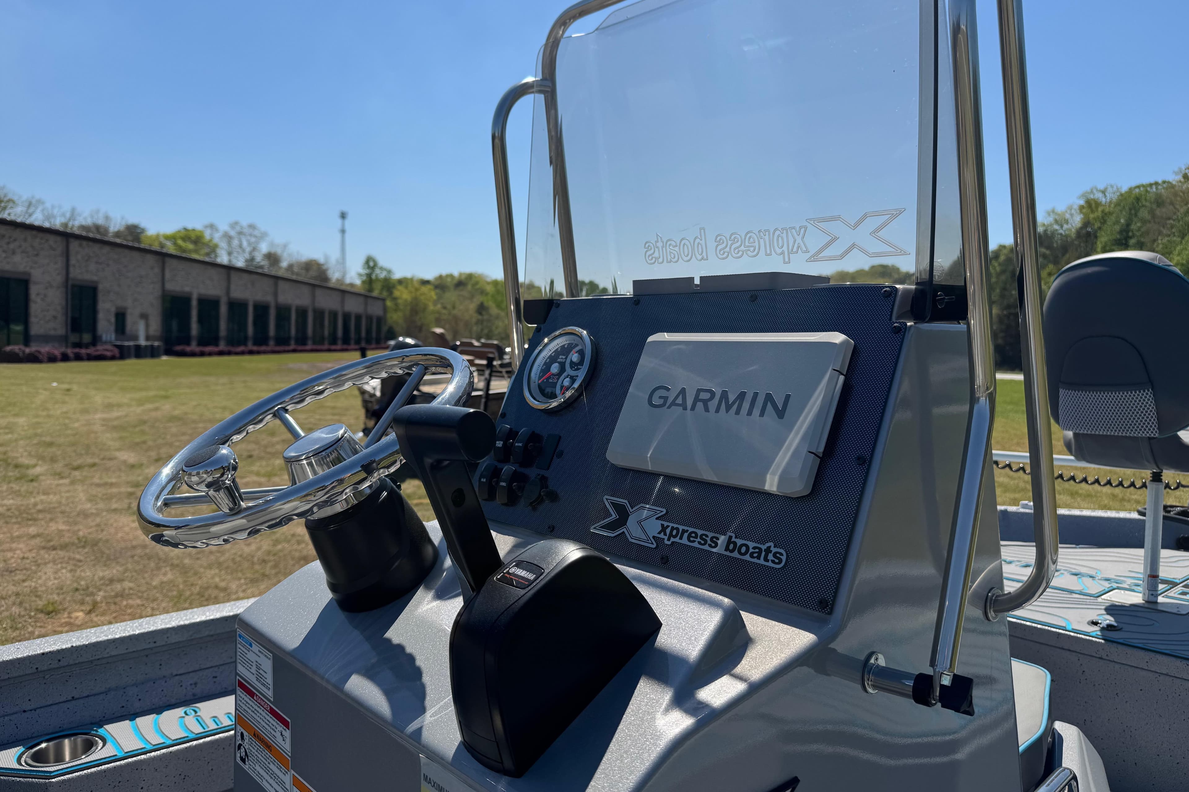 2025 Xpress H20B Bay boat dashboard with Garmin navigation system.