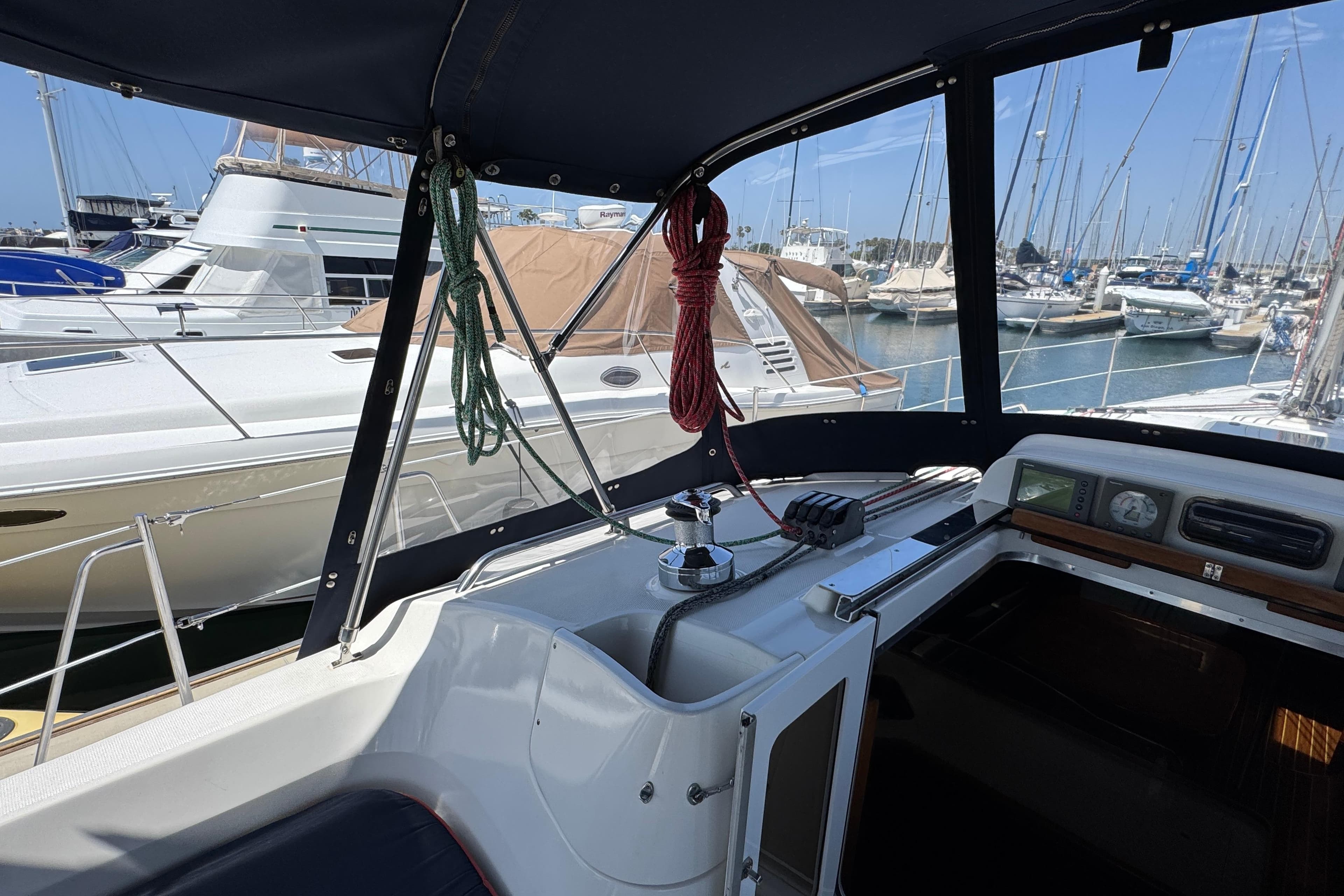2004 Hunter 41 Aft Cockpit sailboat interior with marina view.