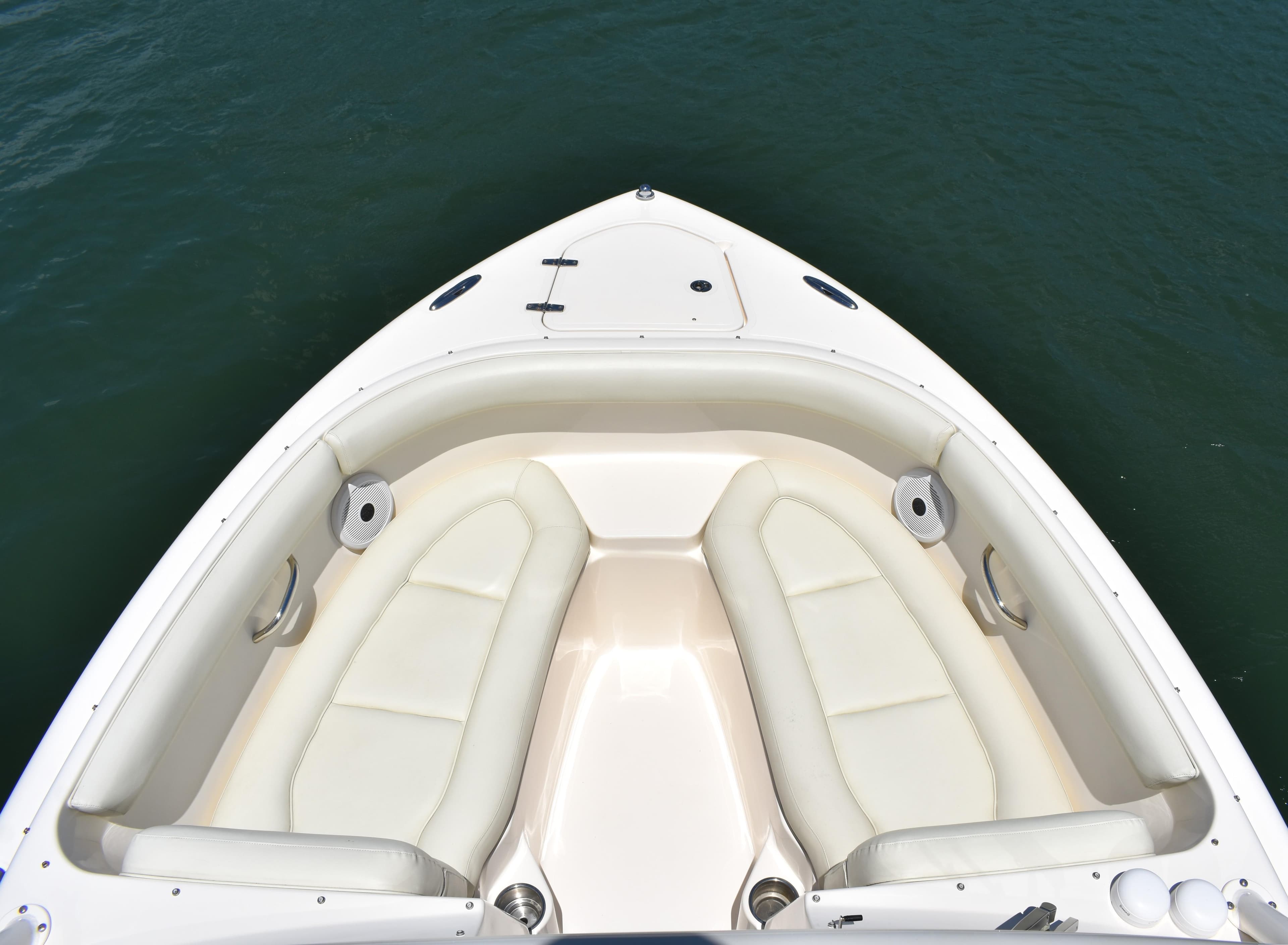 2012 Pursuit DC 265 Dual Console boat with spacious seating on calm water.