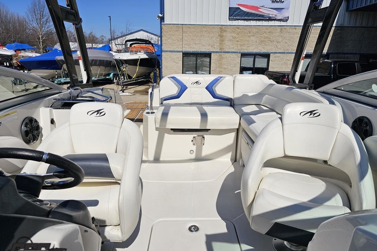 2013 Monterey M3 Sport Boat interior with white seating and steering wheel.