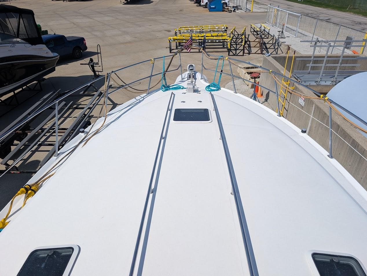 1995 Sea Ray 400 Express Cruiser on dry dock, viewed from the bow.