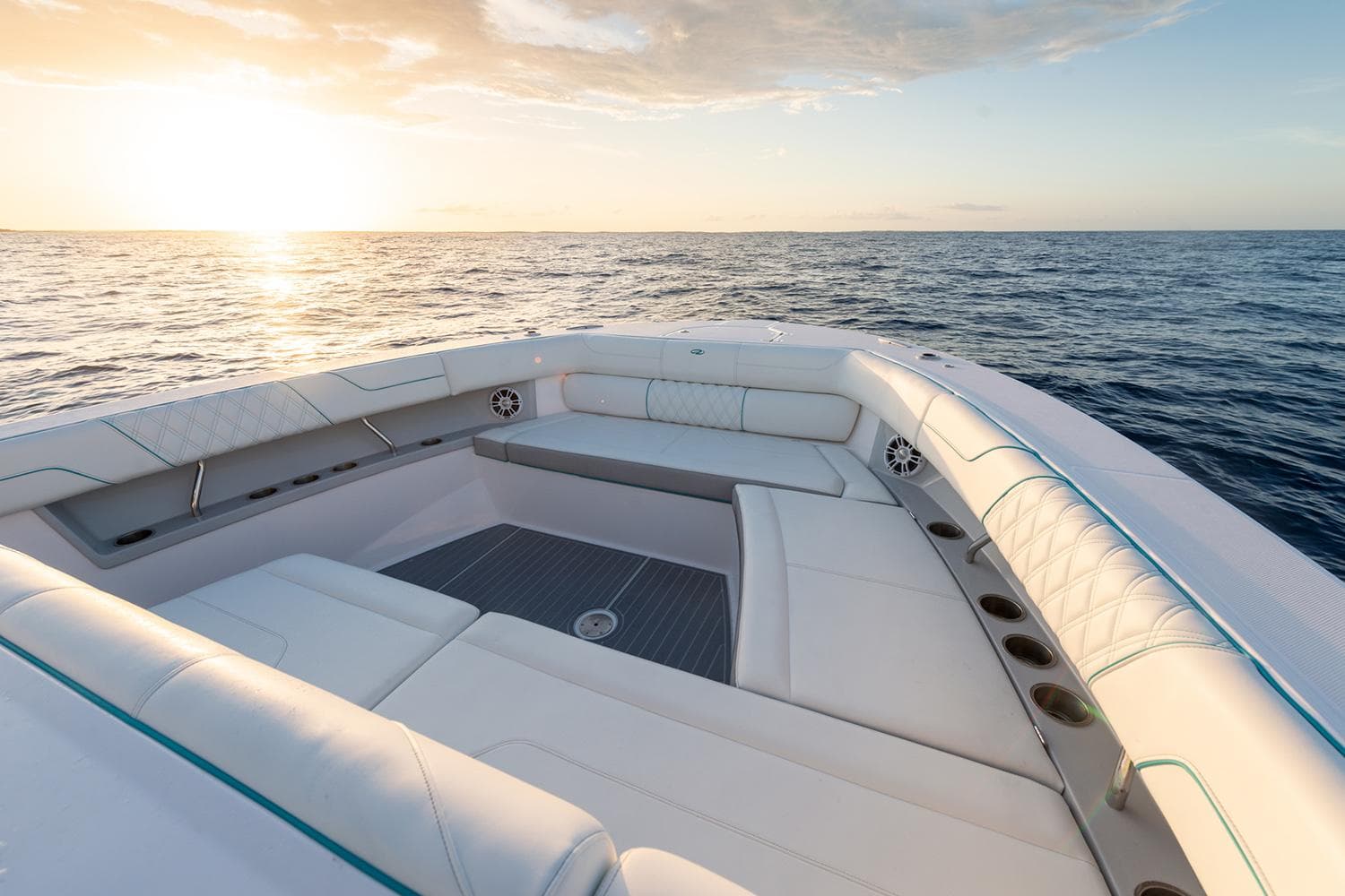 Manufacturer Provided Image: Luxurious 2026 Regal 38 SAV boat interior at sunset on the open sea.