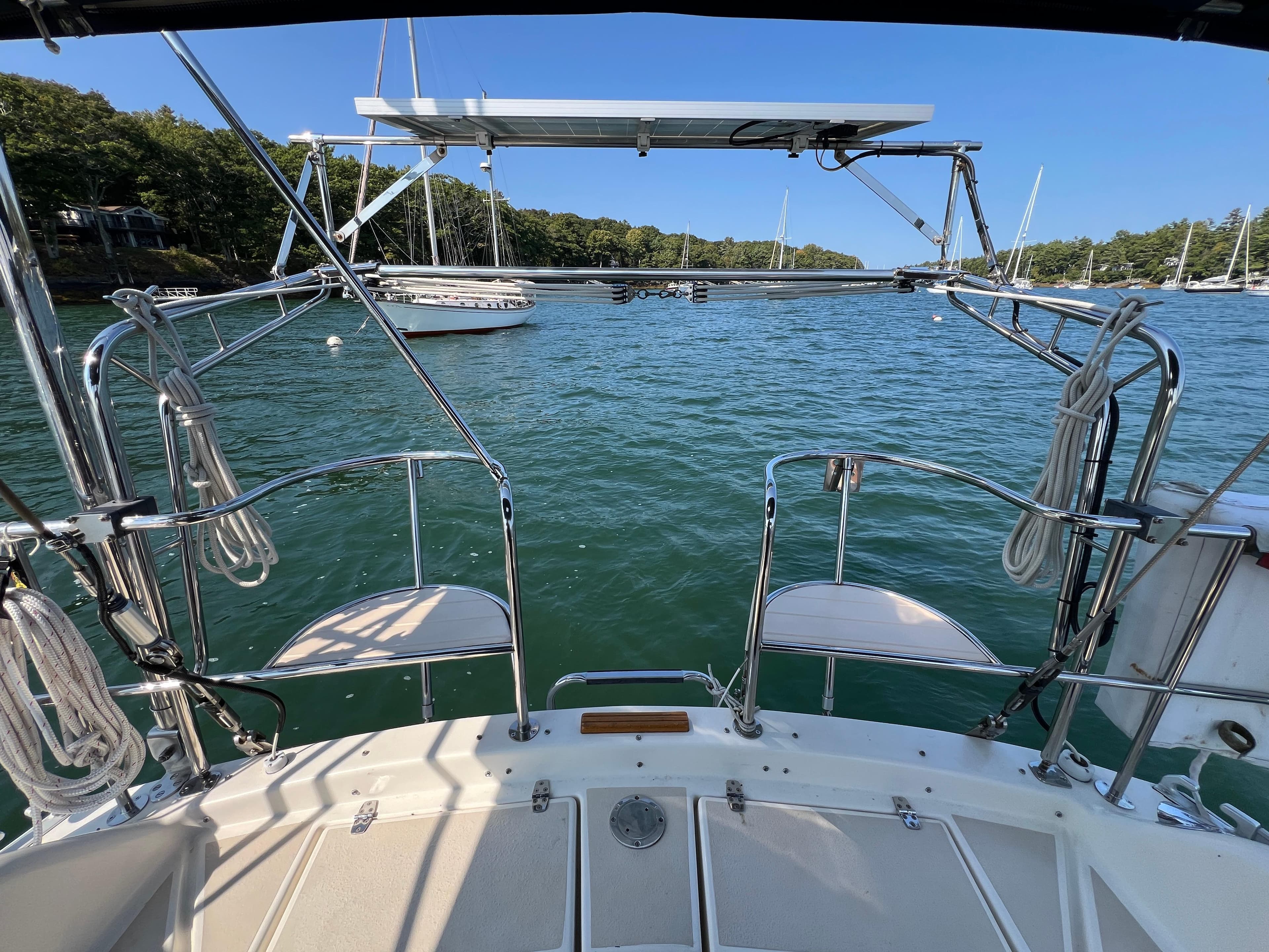 Caliber 40LRC SE 2005 yacht docked with scenic water view.